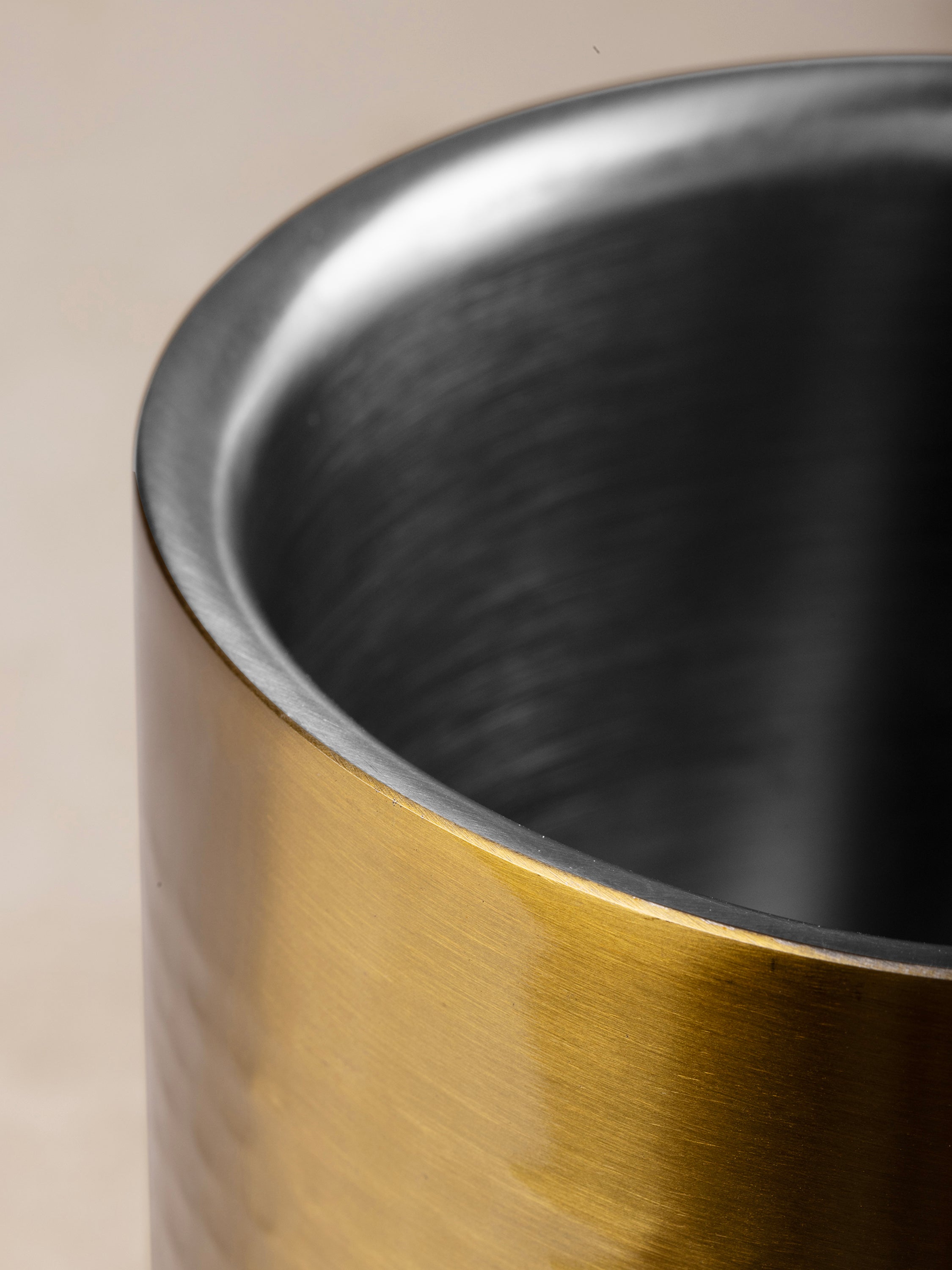 Artisan-made wine cooler in matte gold finish with soft texture and luxe presence — luxury home accessory