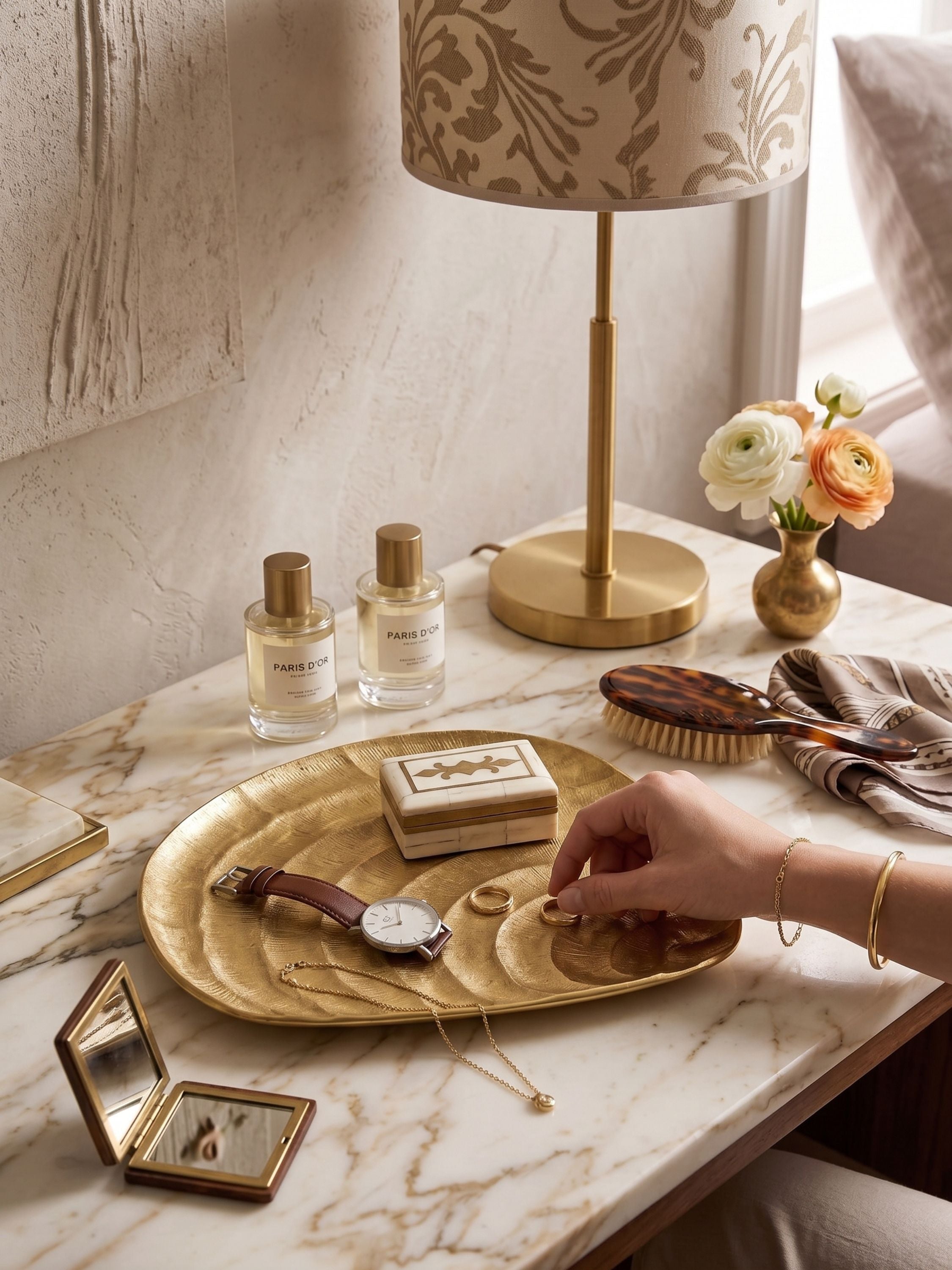 Gold aluminum decorative tray with curved organic form and directional ribbed texture, featuring sculpted wave pattern in a clean front-facing composition