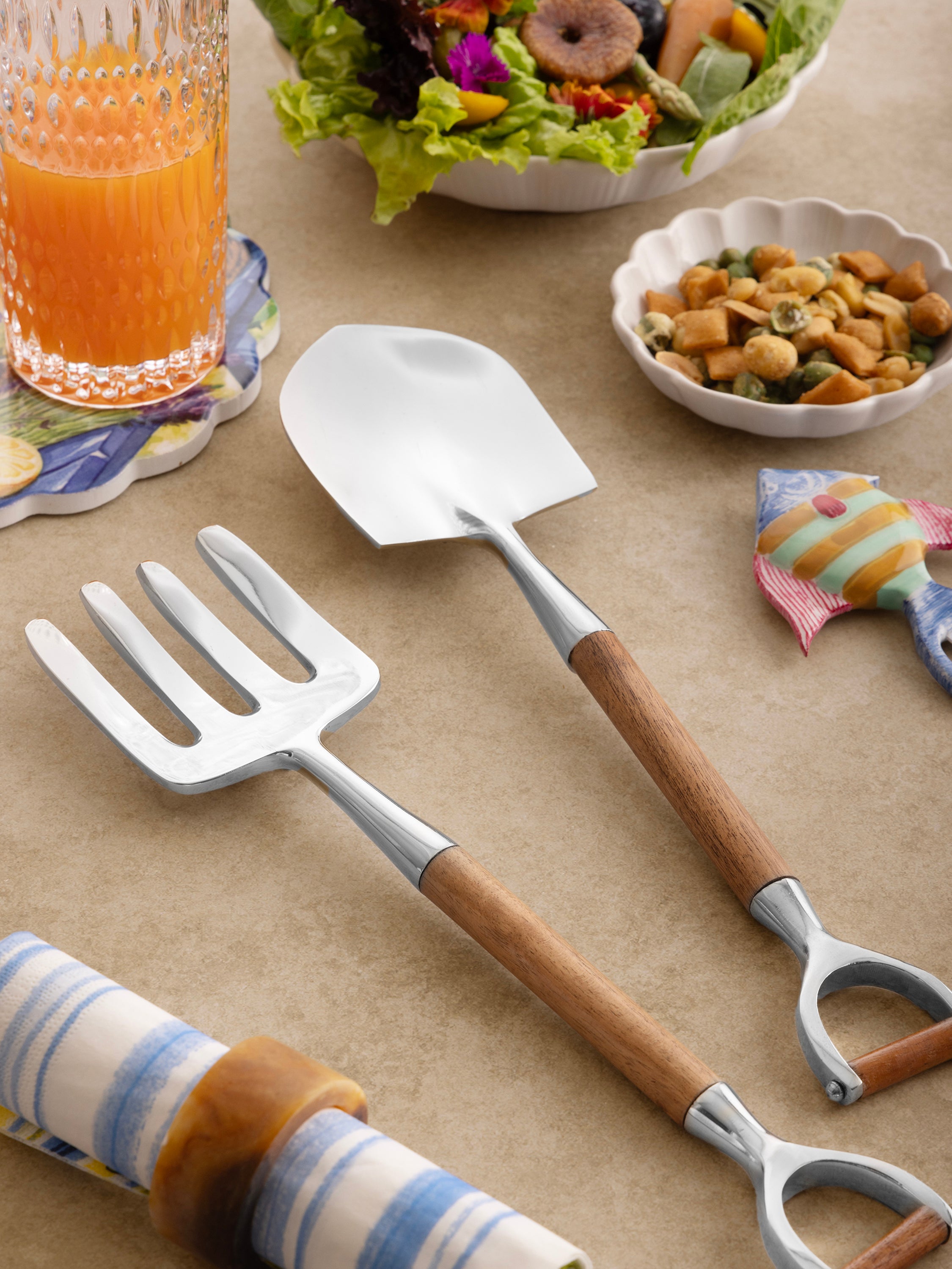 Wood-handled salad spoon and fork pair with shiny silver finish — refined dining accessory