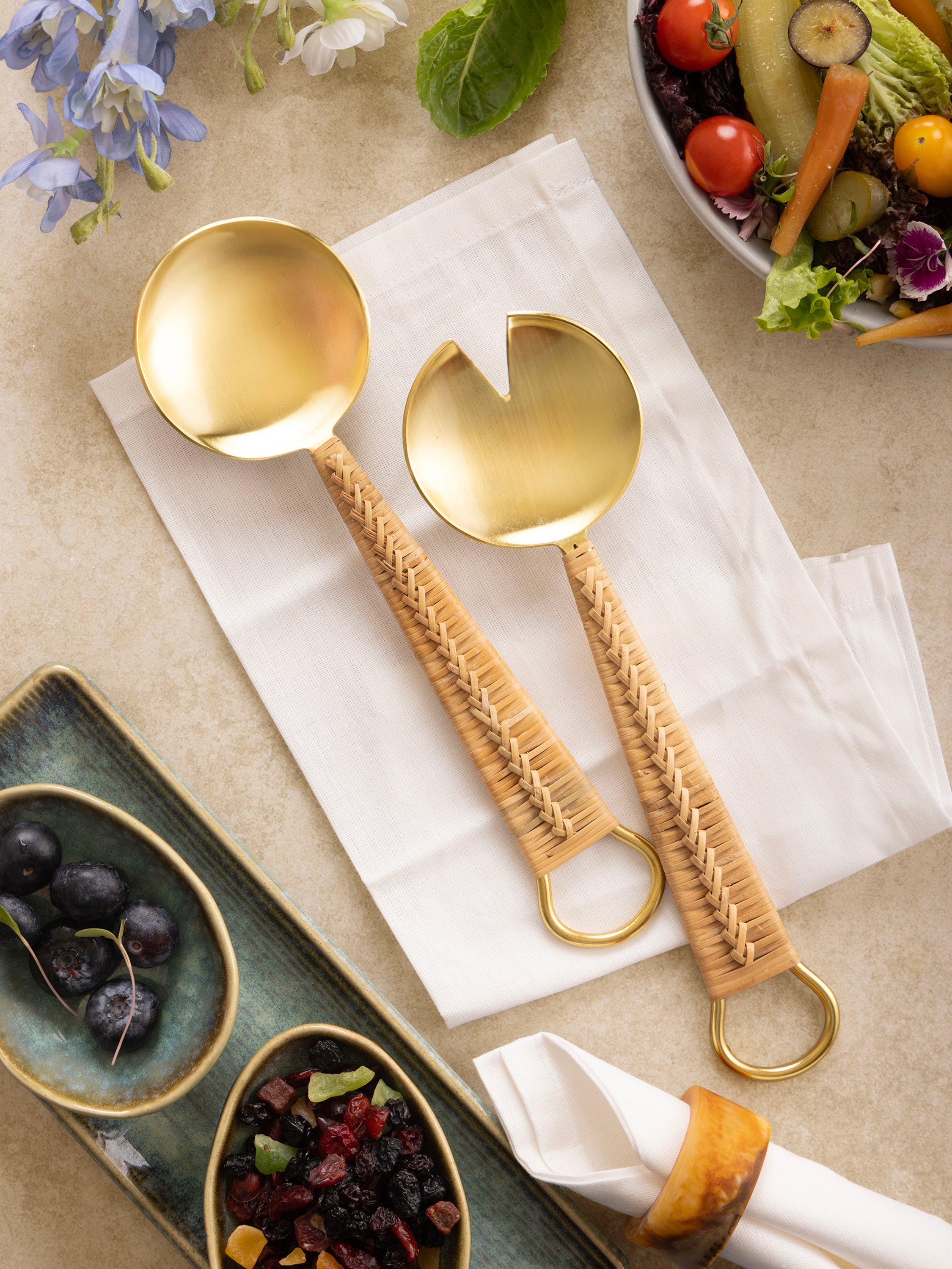 Gold finish salad serving spoon and fork with rattan handles — refined dining accessory