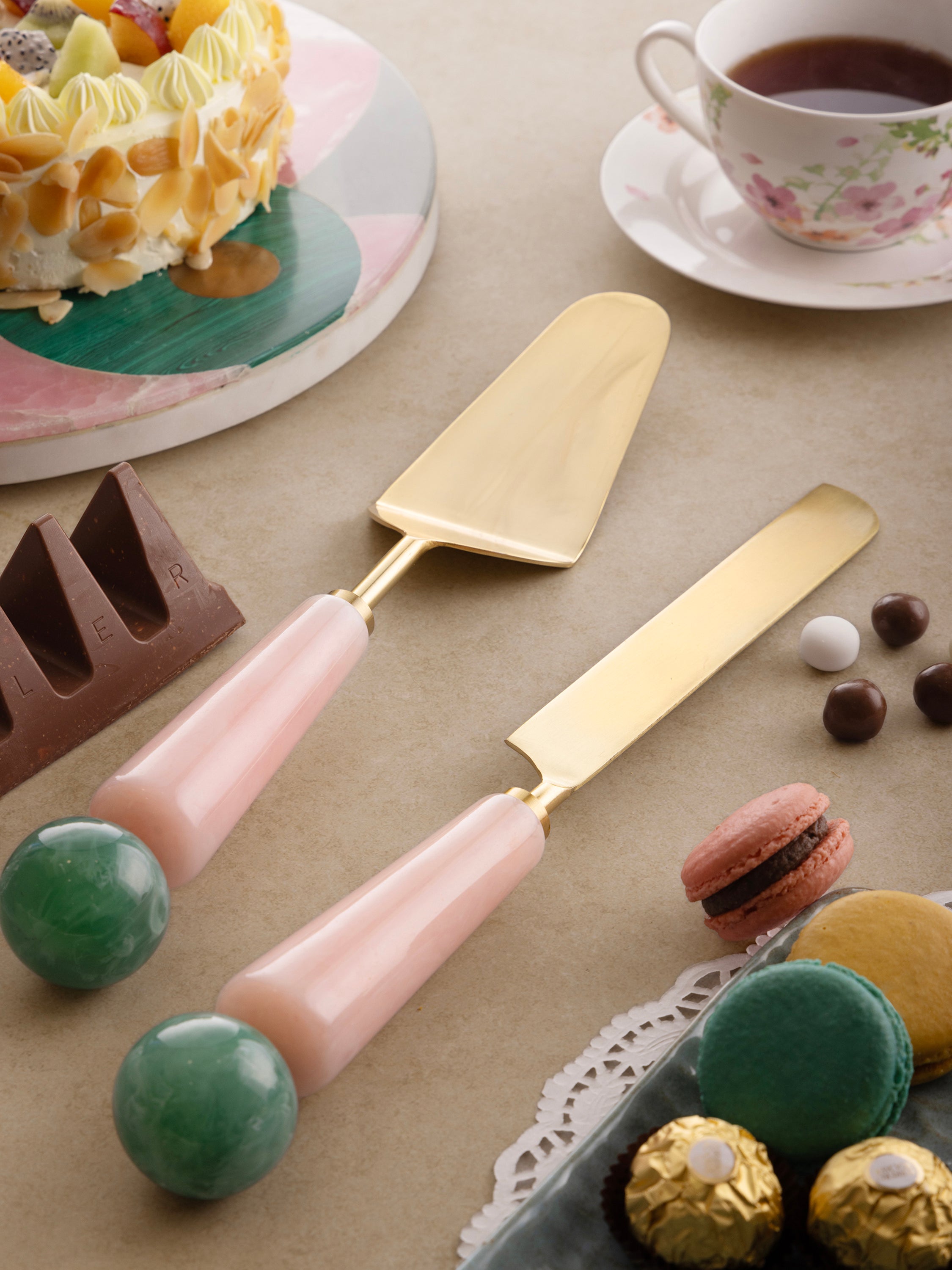 Cake knife and server in matte gold finish with pastel resin handles — elegant handcrafted dessert accessory