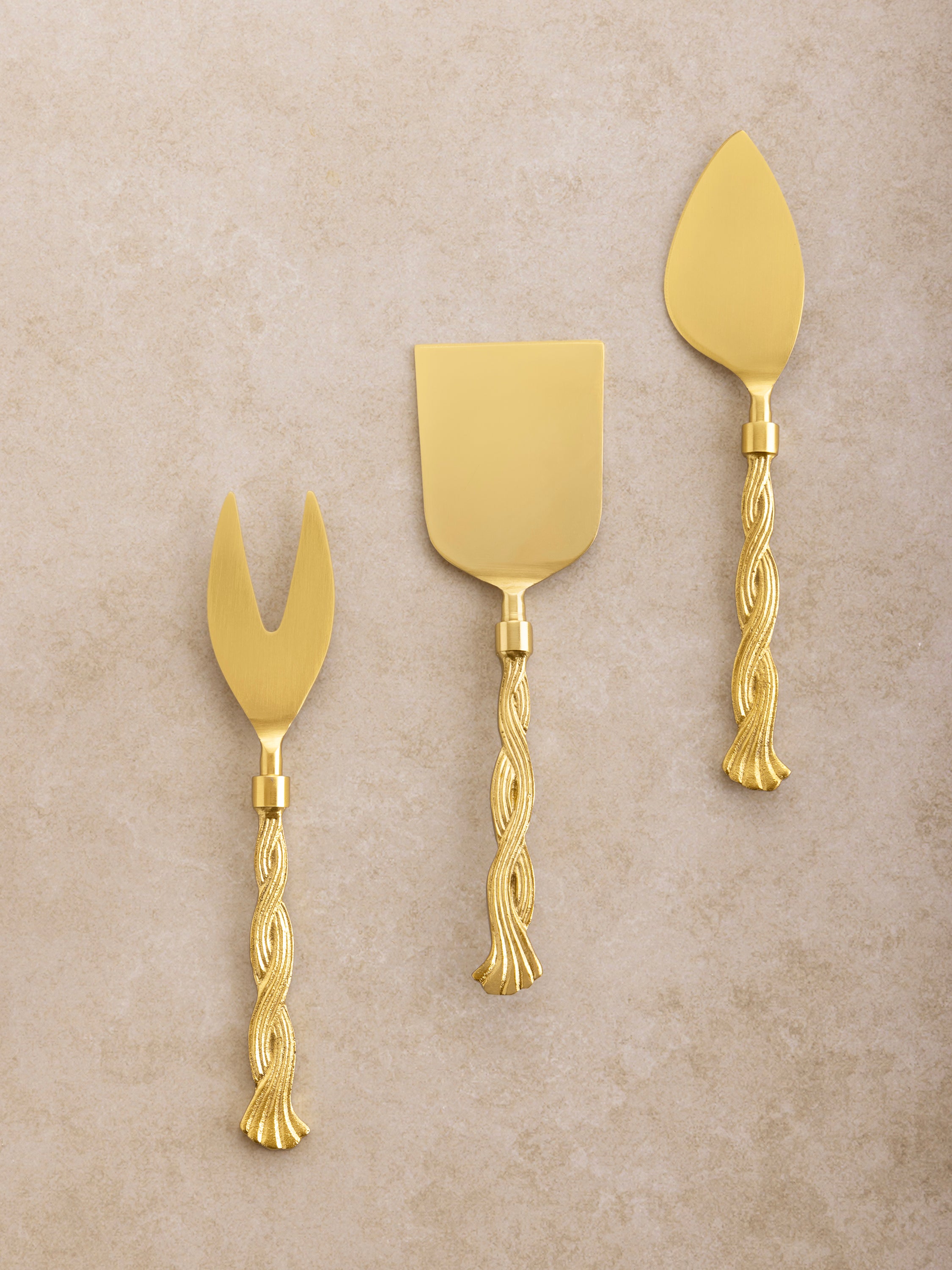 Matte gold cheese knives set of three with twisted rope-style handles — luxury serveware