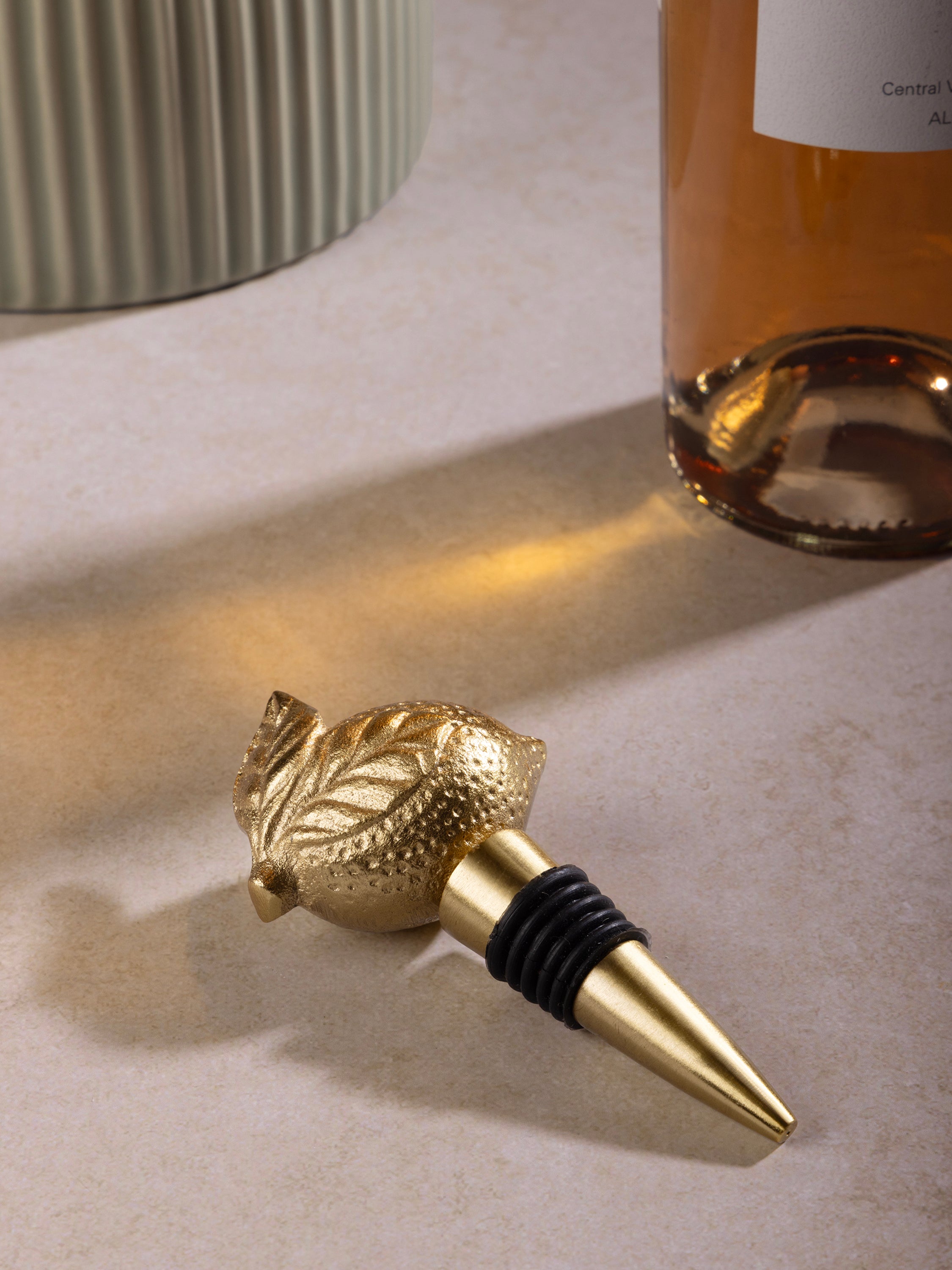 Gold-tone wine stopper — minimalist bar accent with brushed finish