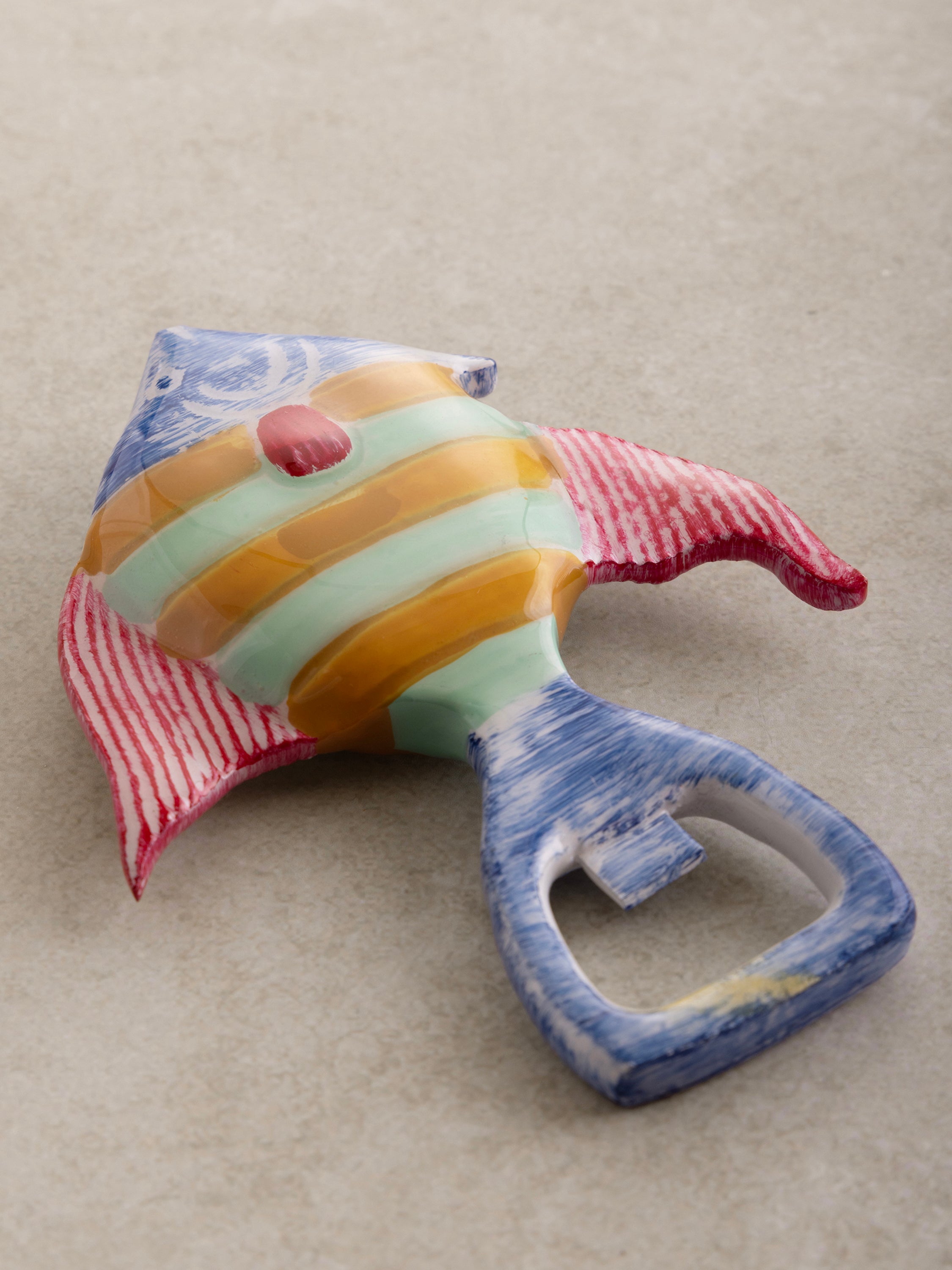 Artistic fish bottle opener, perfect for beach-themed kitchens and bars