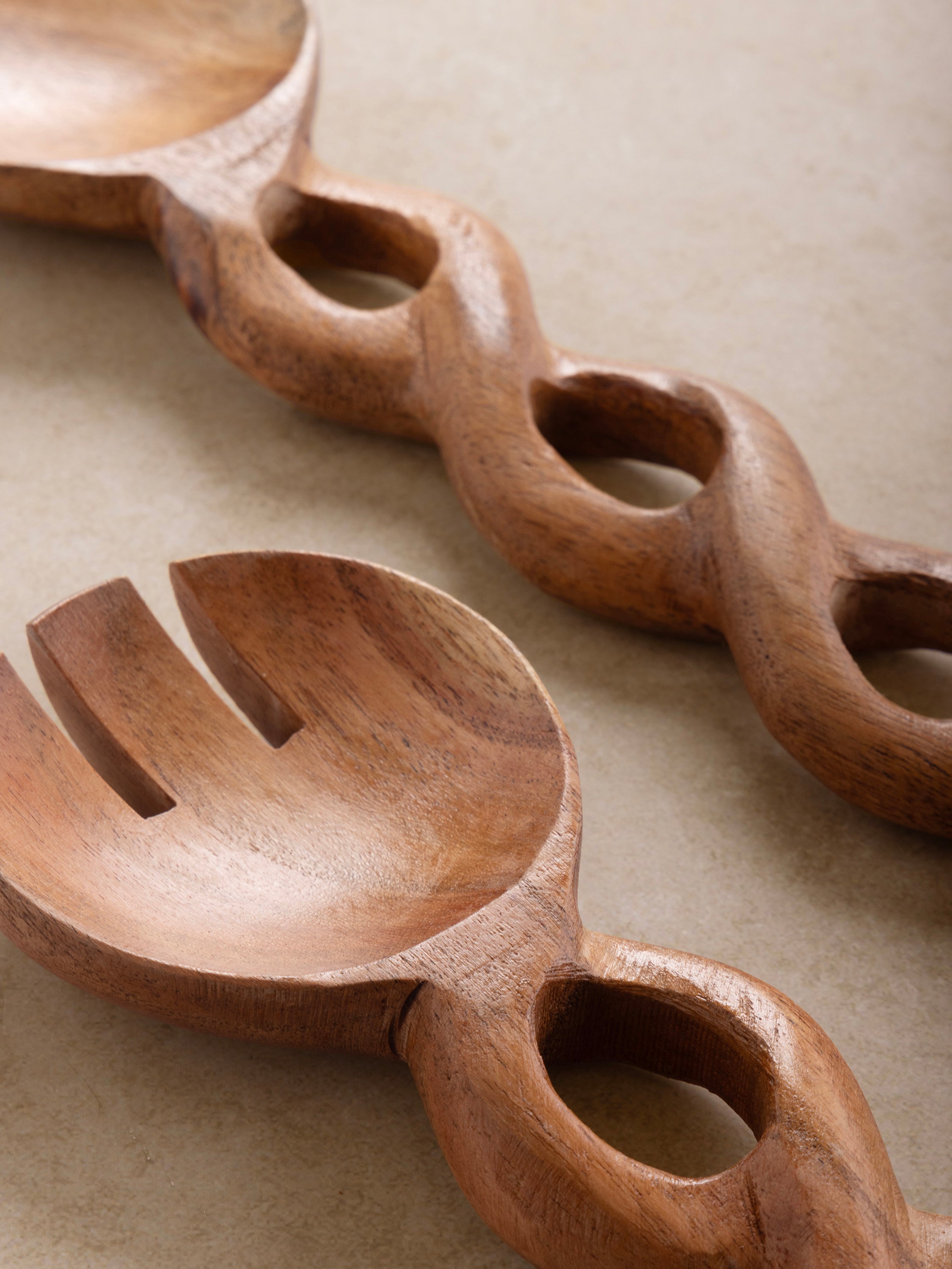 Artisan wooden salad serving utensils, perfect for eco-friendly dining