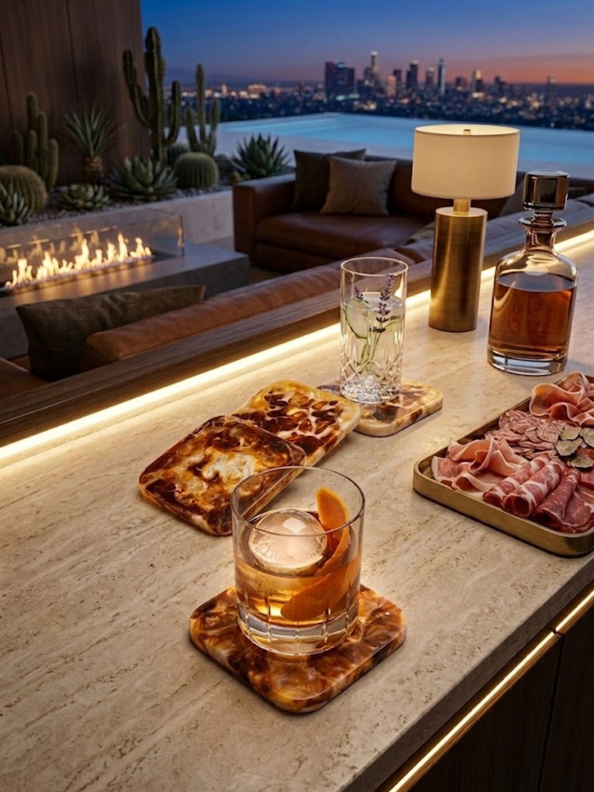 Marbled amber resin coasters shown in a sunset lounge setting by a firepit.
