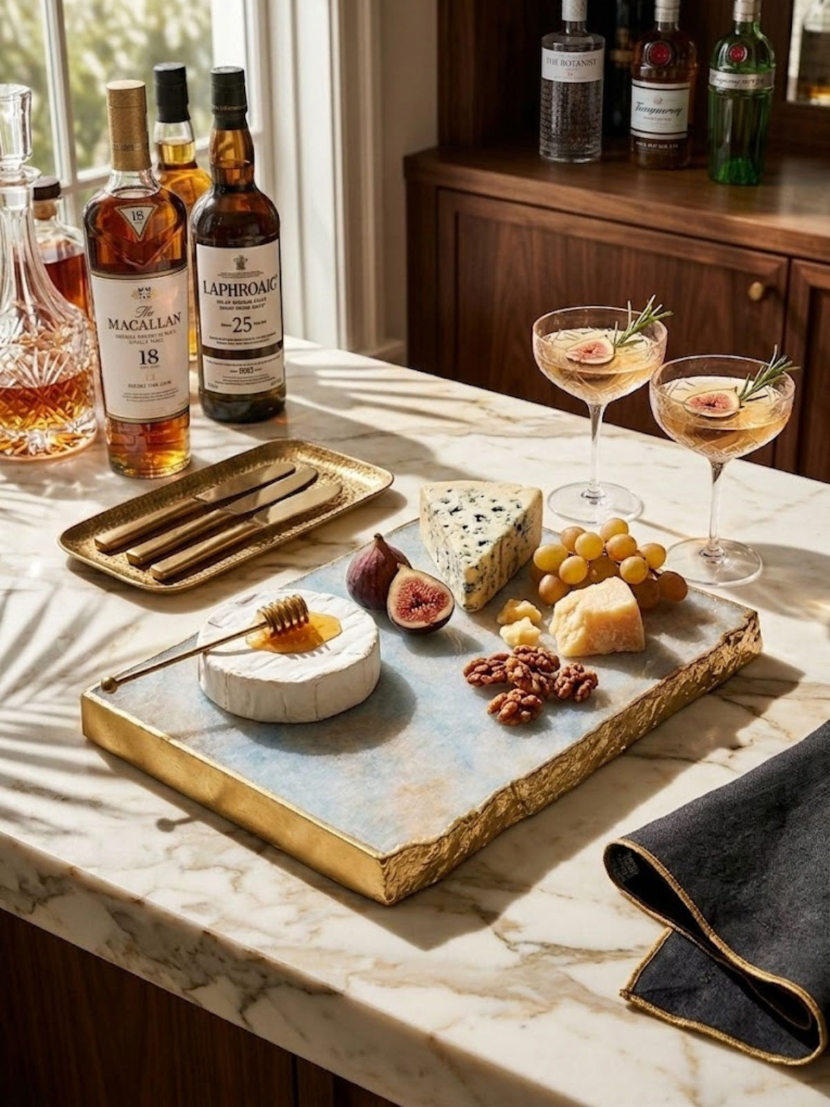 Aventurine stone cheese board in a muted blue-grey tone, styled on a home bar.