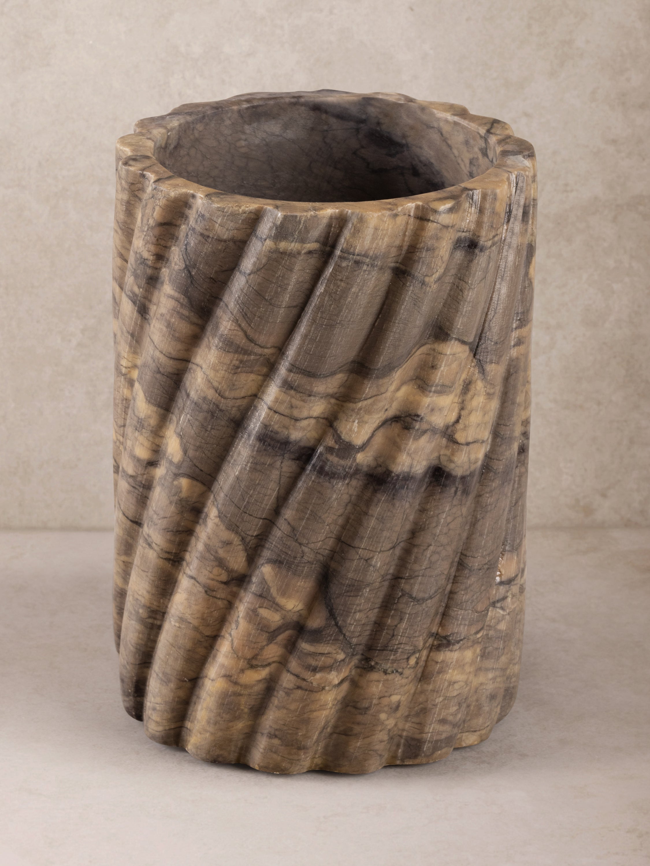 Handcrafted marble wine cooler in hazel brown onyx — artisan luxury bar accent