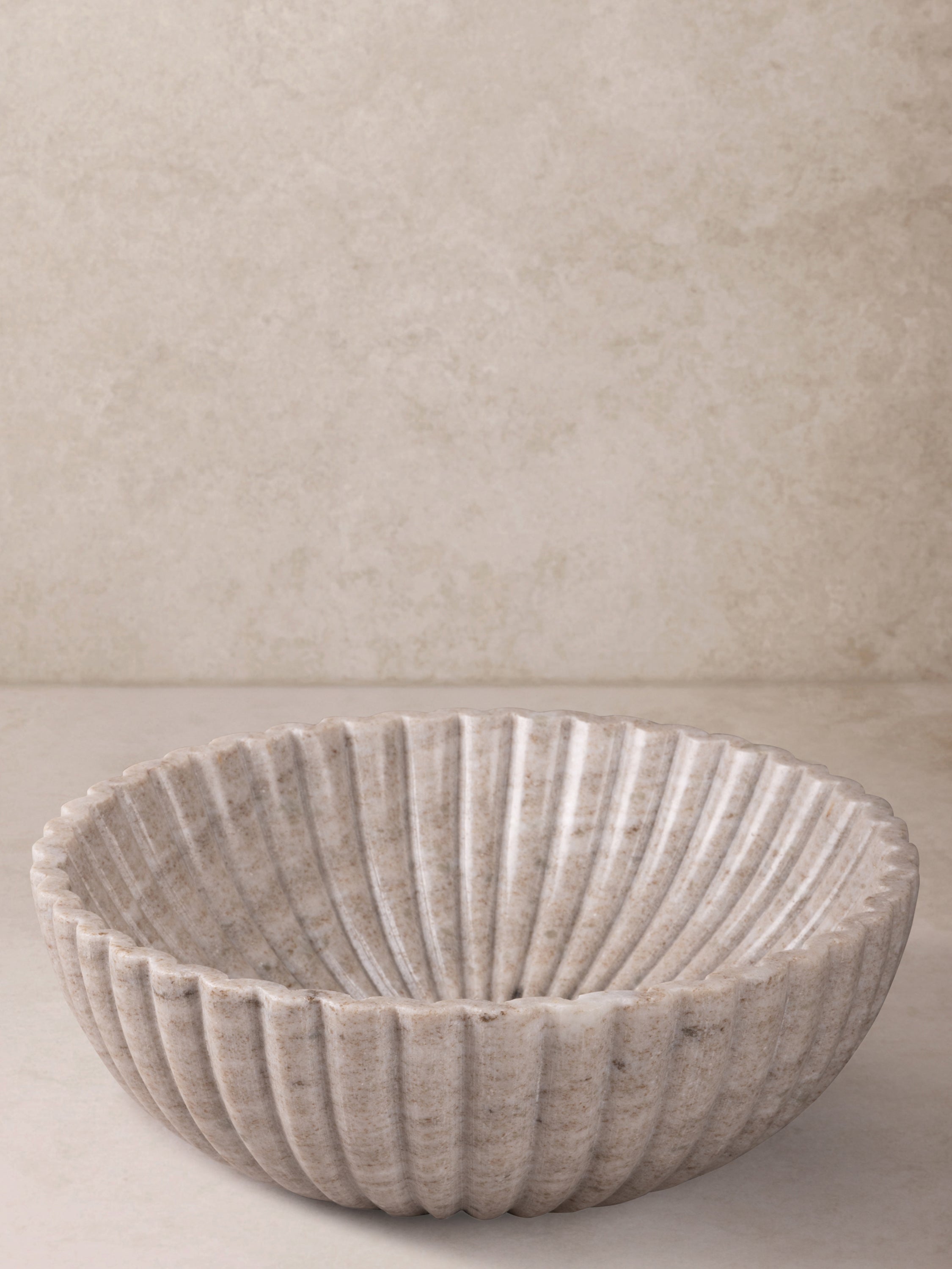Cairo beige marble bowl with fluted design
