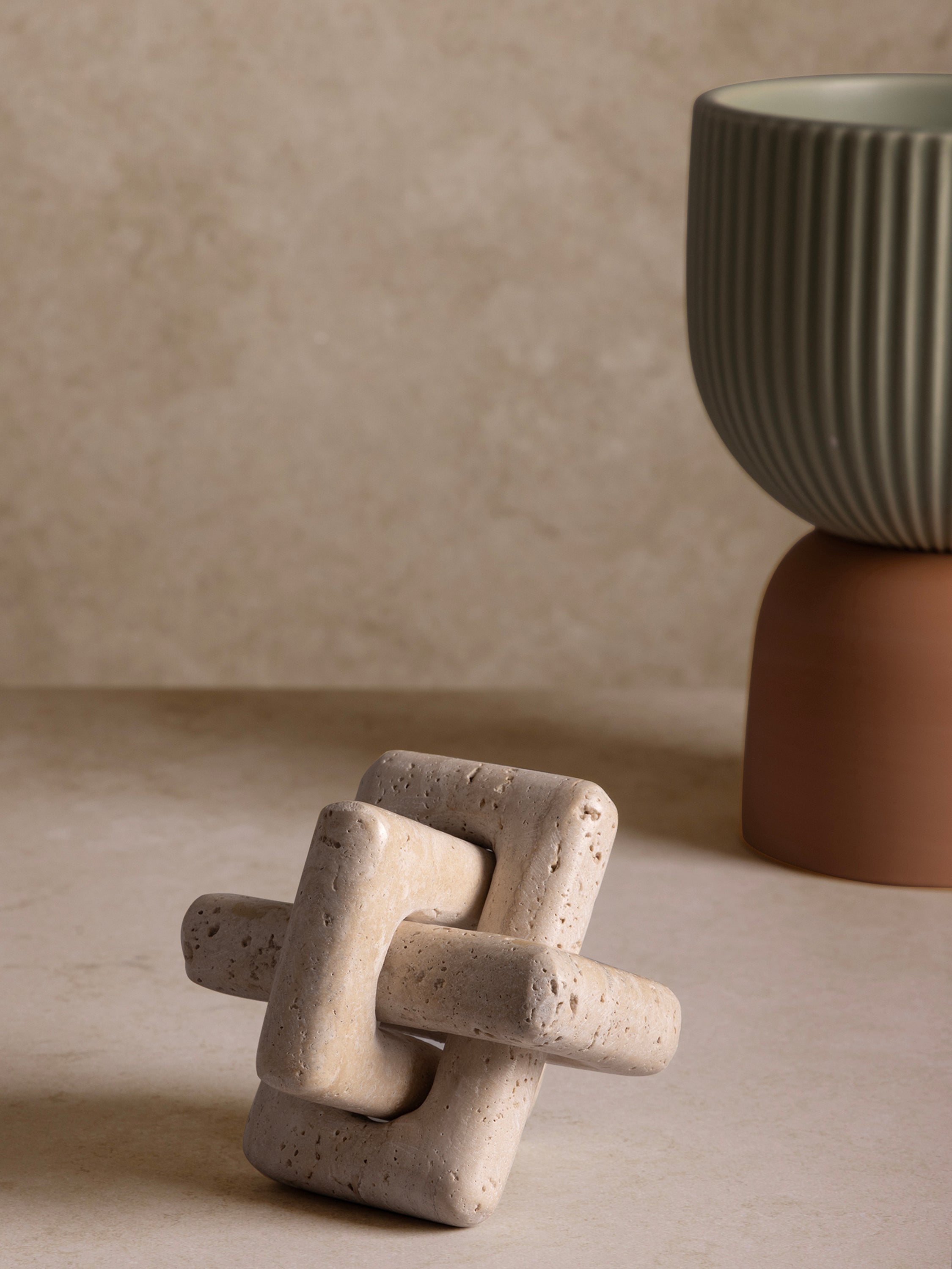 Modern Minimalist Travertine Knot Ornament – A neutral-toned sculptural piece, great for contemporary interiors and shelf styling