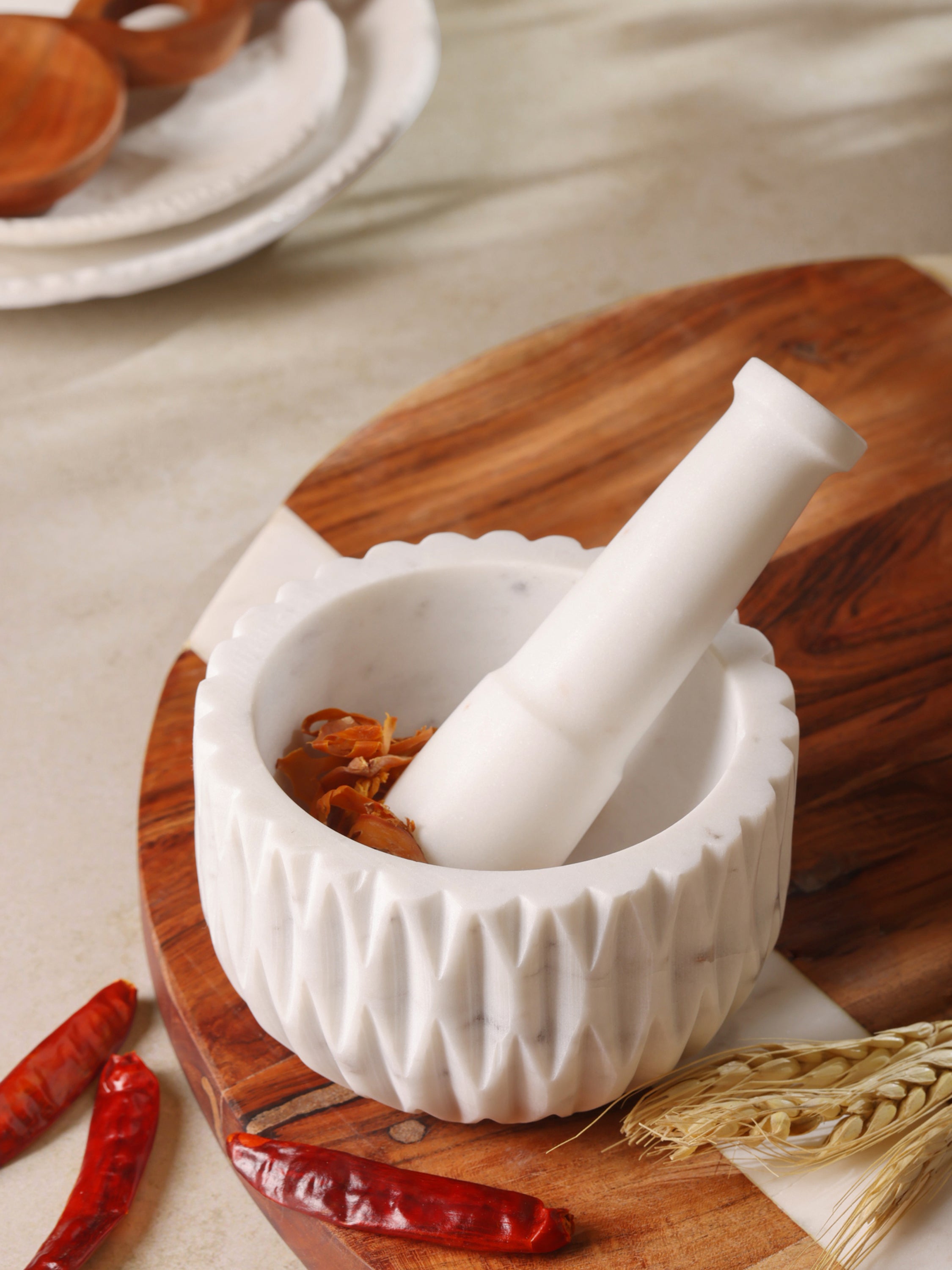 Marble mortar & pestle styled on kitchen countertop