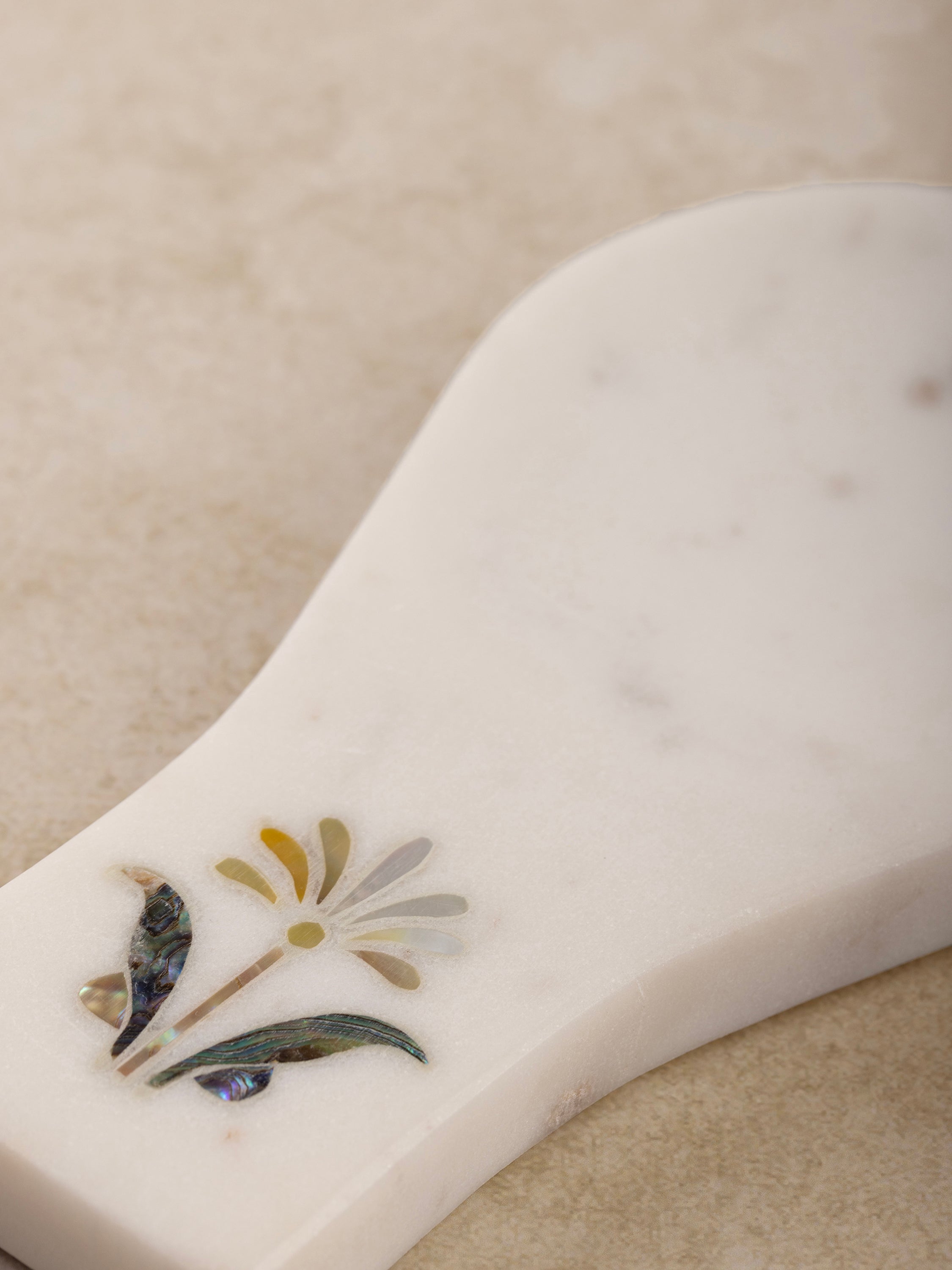 Close-up of inlay detail and marble polish on Jaipore Spoon Rest