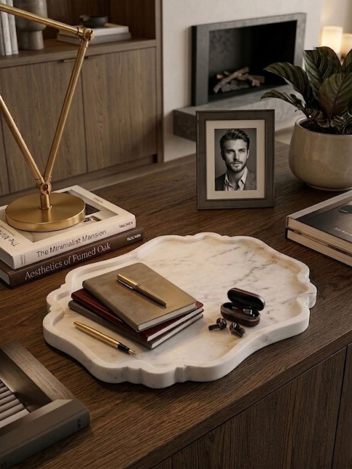 White marble tray with fine grey veining, styled on a study desk.