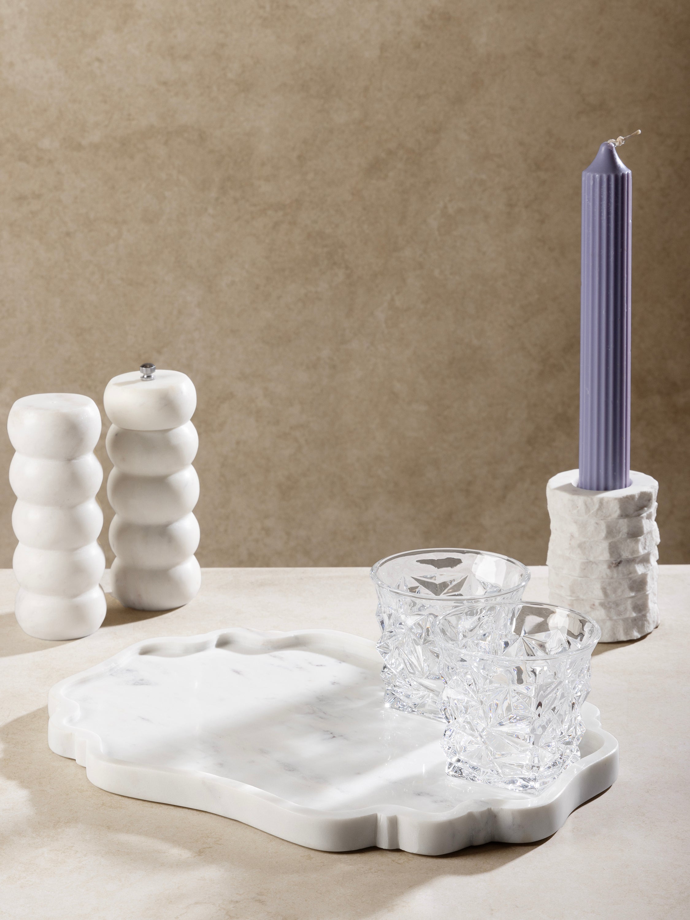 Cascade Tray styled with candles and decorative accents