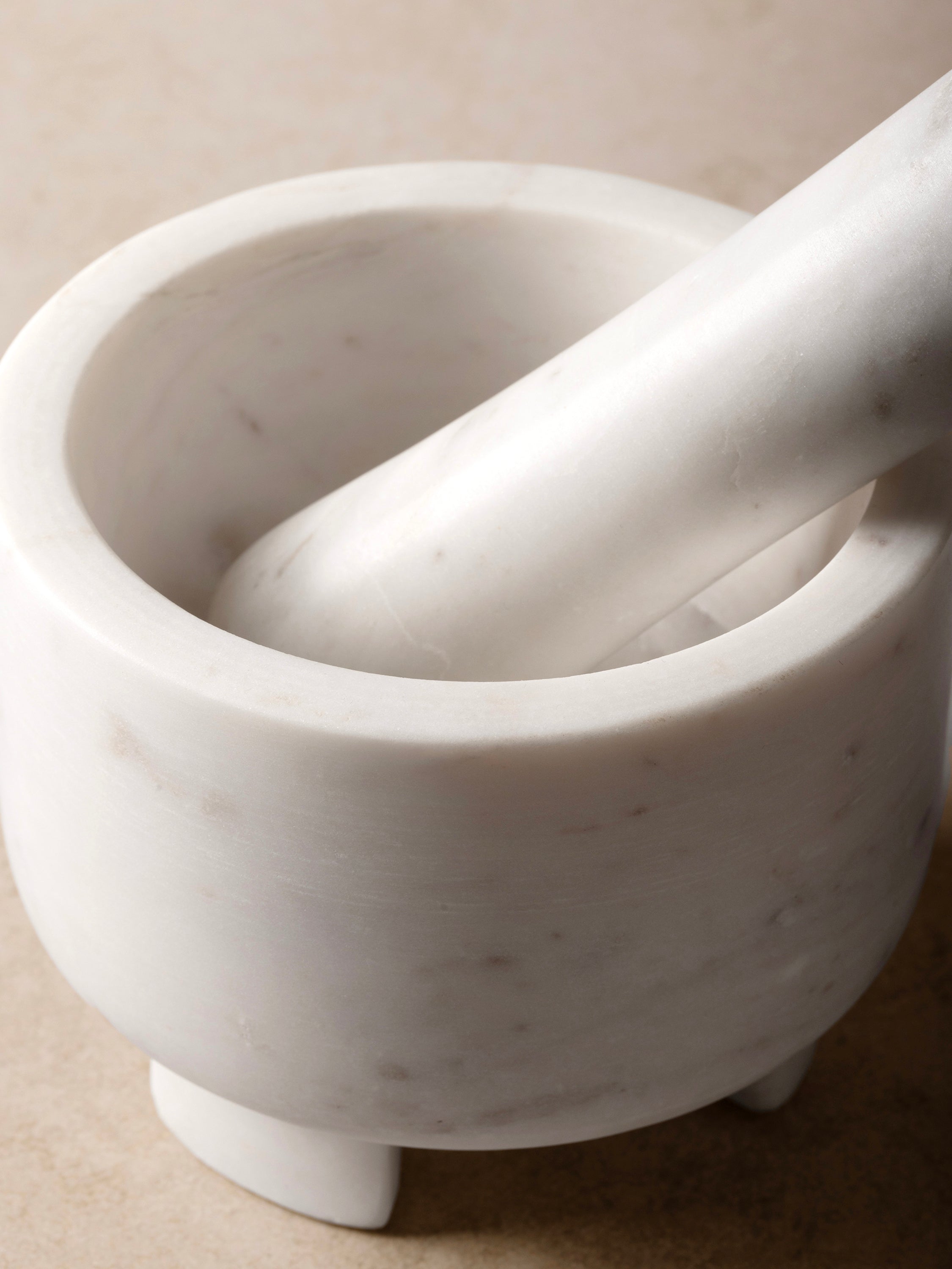 Close-up showing natural veining and polished marble of Odessa set