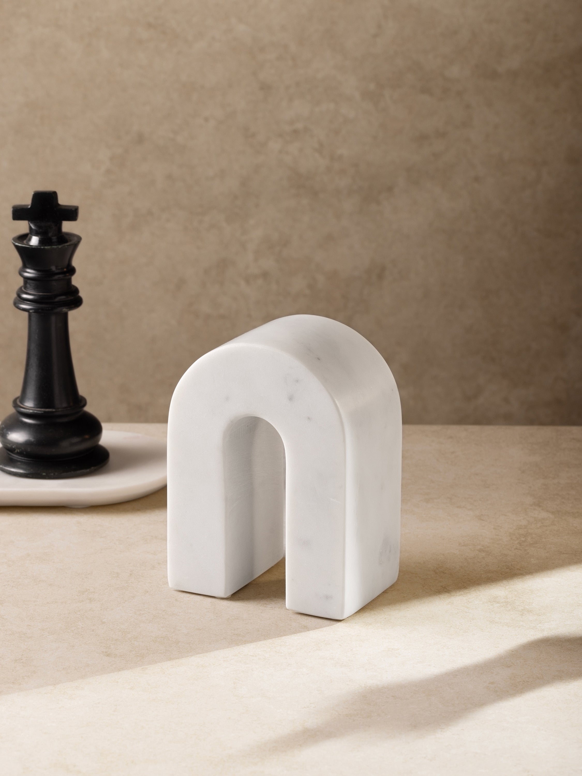 Quest decorative object styled on console shelf with modern décor