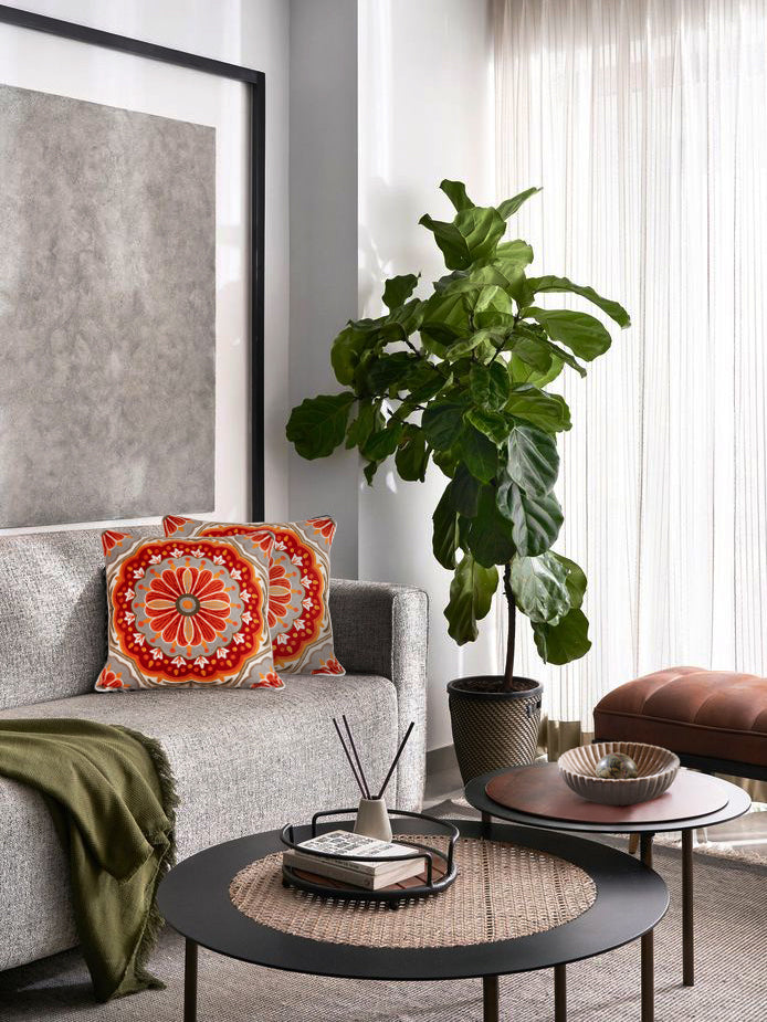 Natural fiber blend throw pillow 20″×20″ with colorful crewel embroidery and tactile texture — sophisticated artisan accent