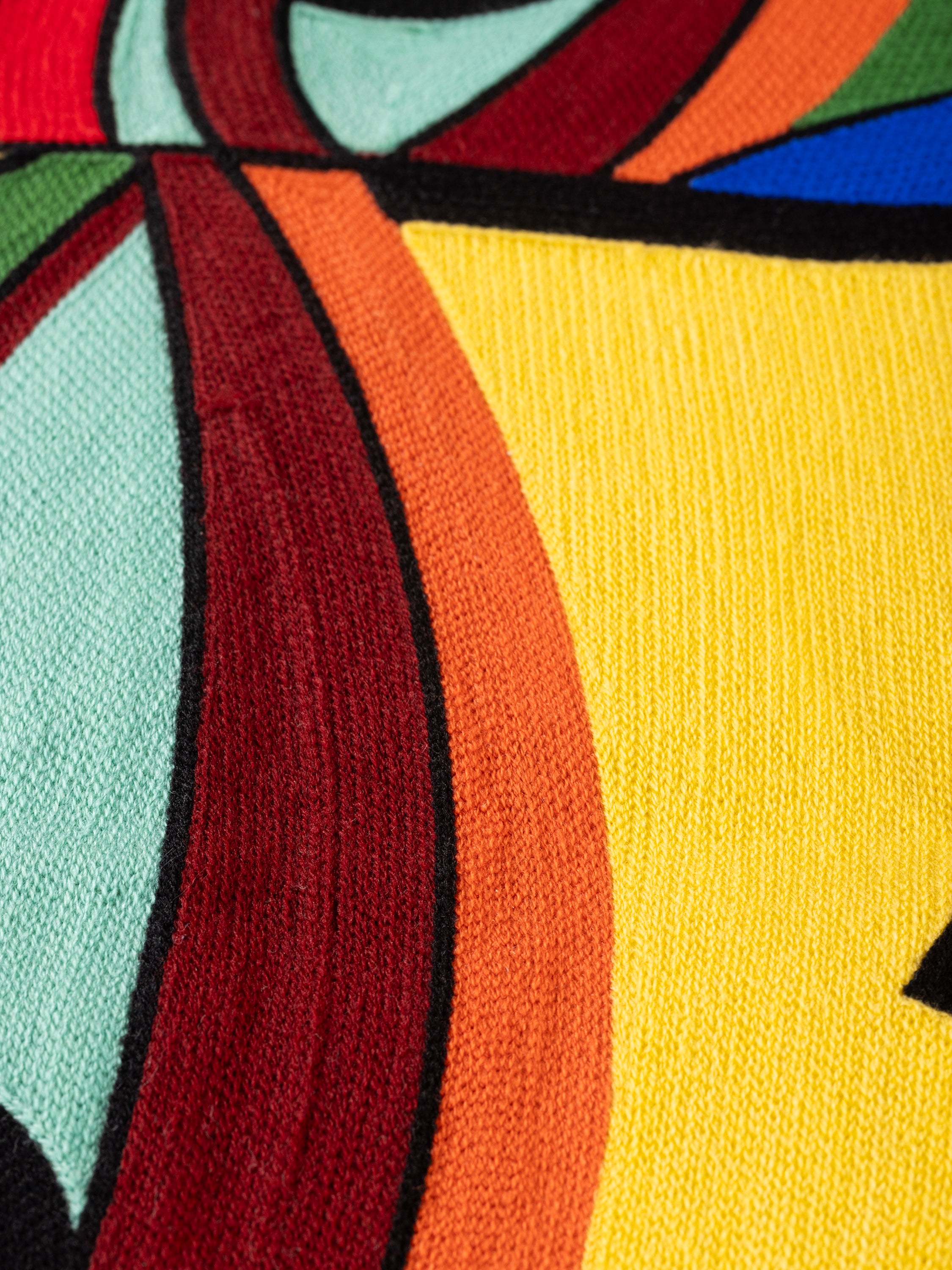 Decorative throw pillow in cotton with detailed heritage embroidery and textured finish — handcrafted design accessory