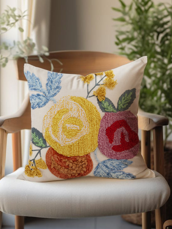 Natural cotton throw pillow 20″×20″ with tufted floral motifs and applique embroidery — sophisticated artisan accent