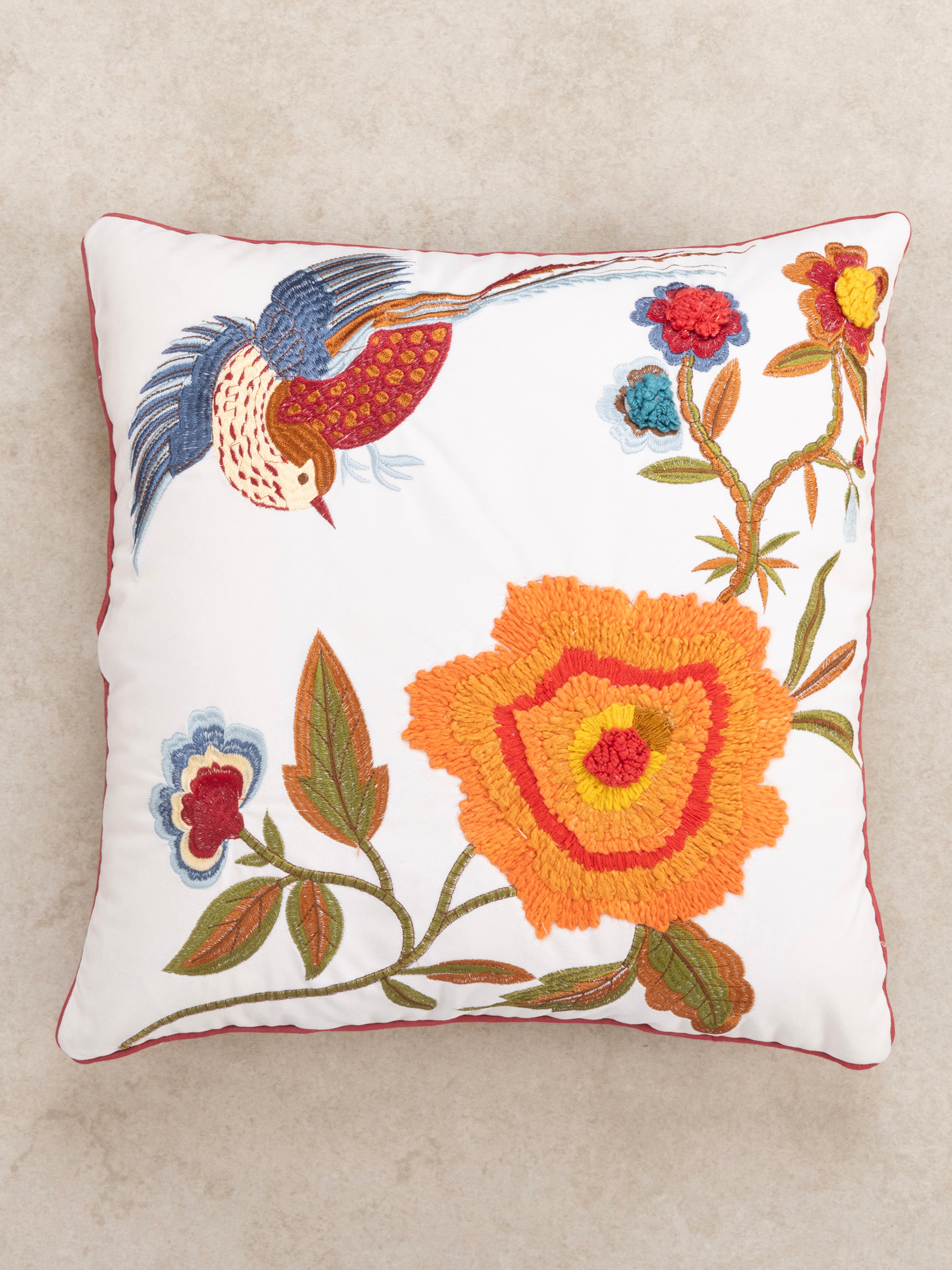 Natural cotton decorative pillow 20″×20″ featuring vivid bird and bloom embroidery — refined artisan décor