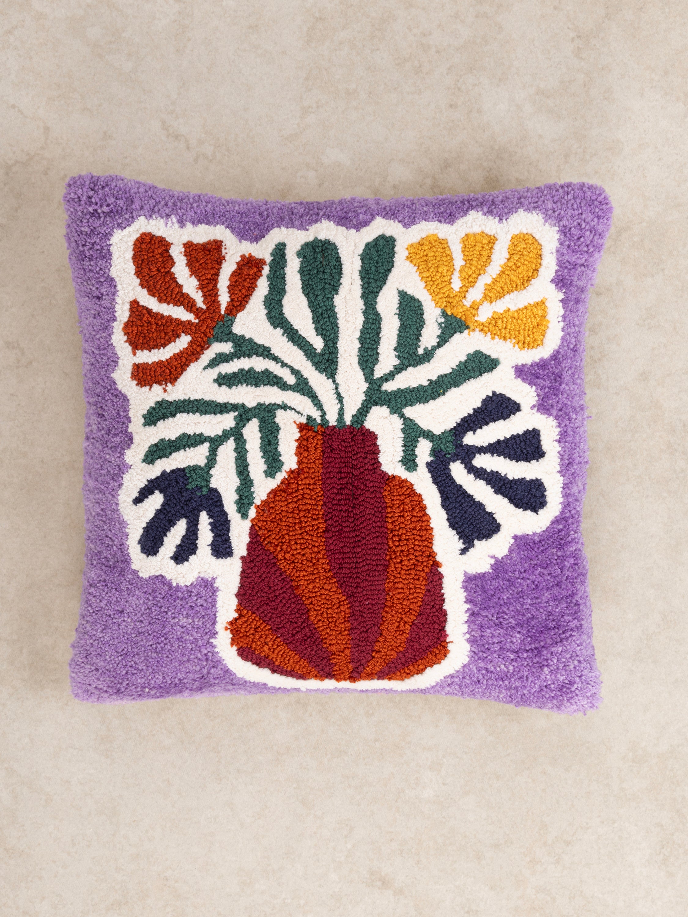 Textured floral vase pillow 20″×20″ in natural fiber blend — refined handcrafted decorative