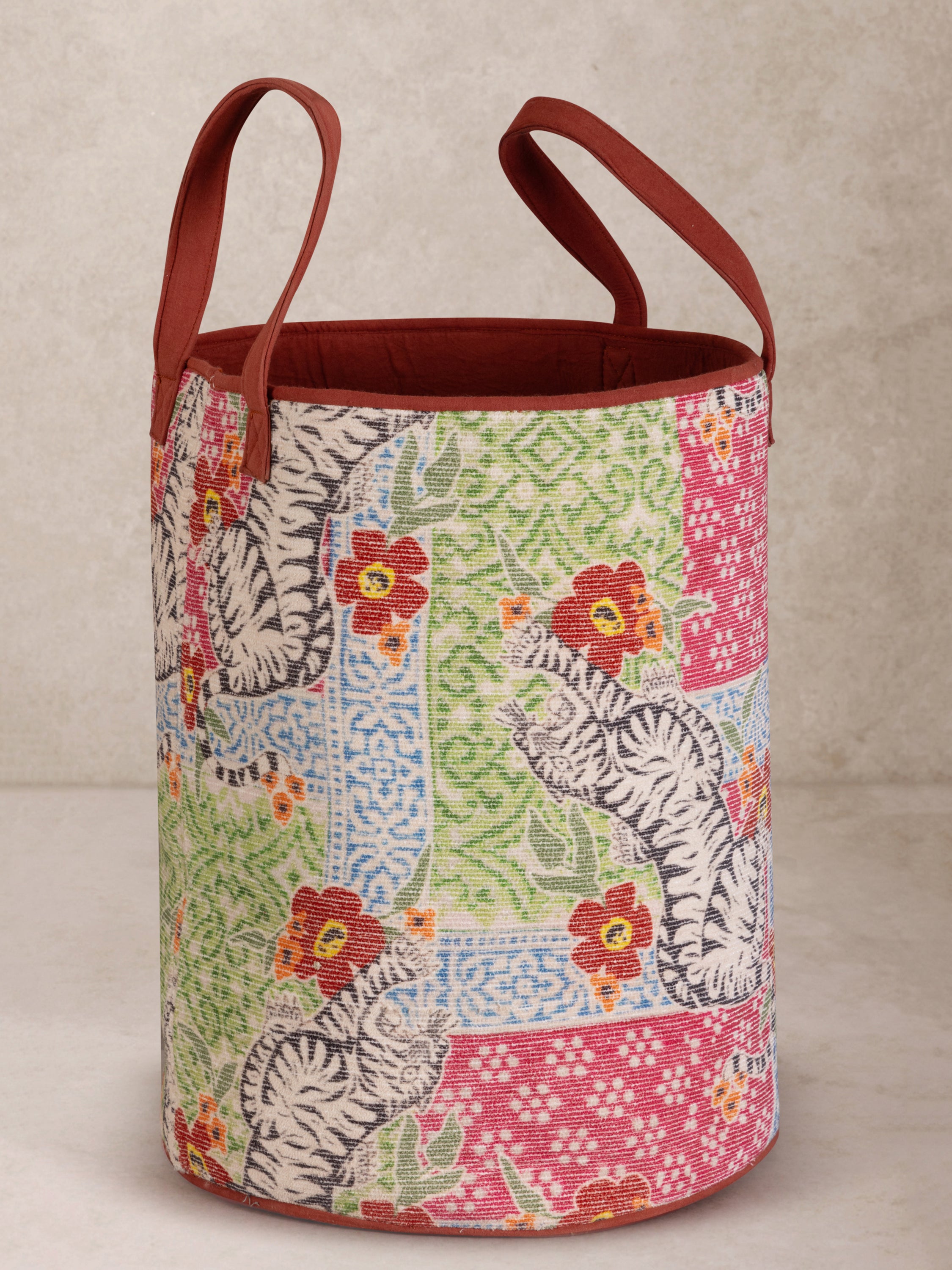 Hand-printed storage basket with floral and tiger motifs — artisan-made home accent
