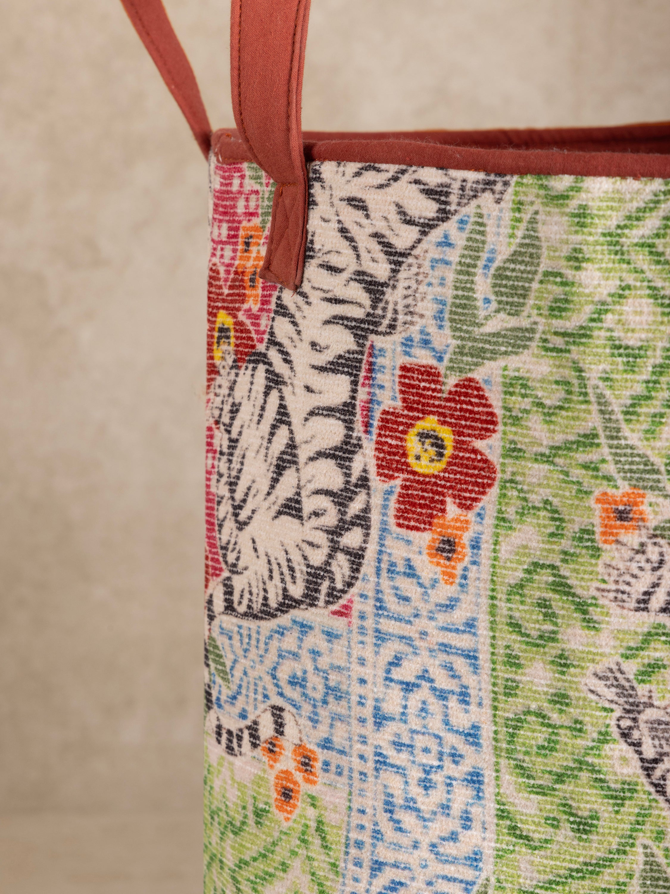 Artisan-crafted storage basket featuring bold print and durable construction — refined functional décor