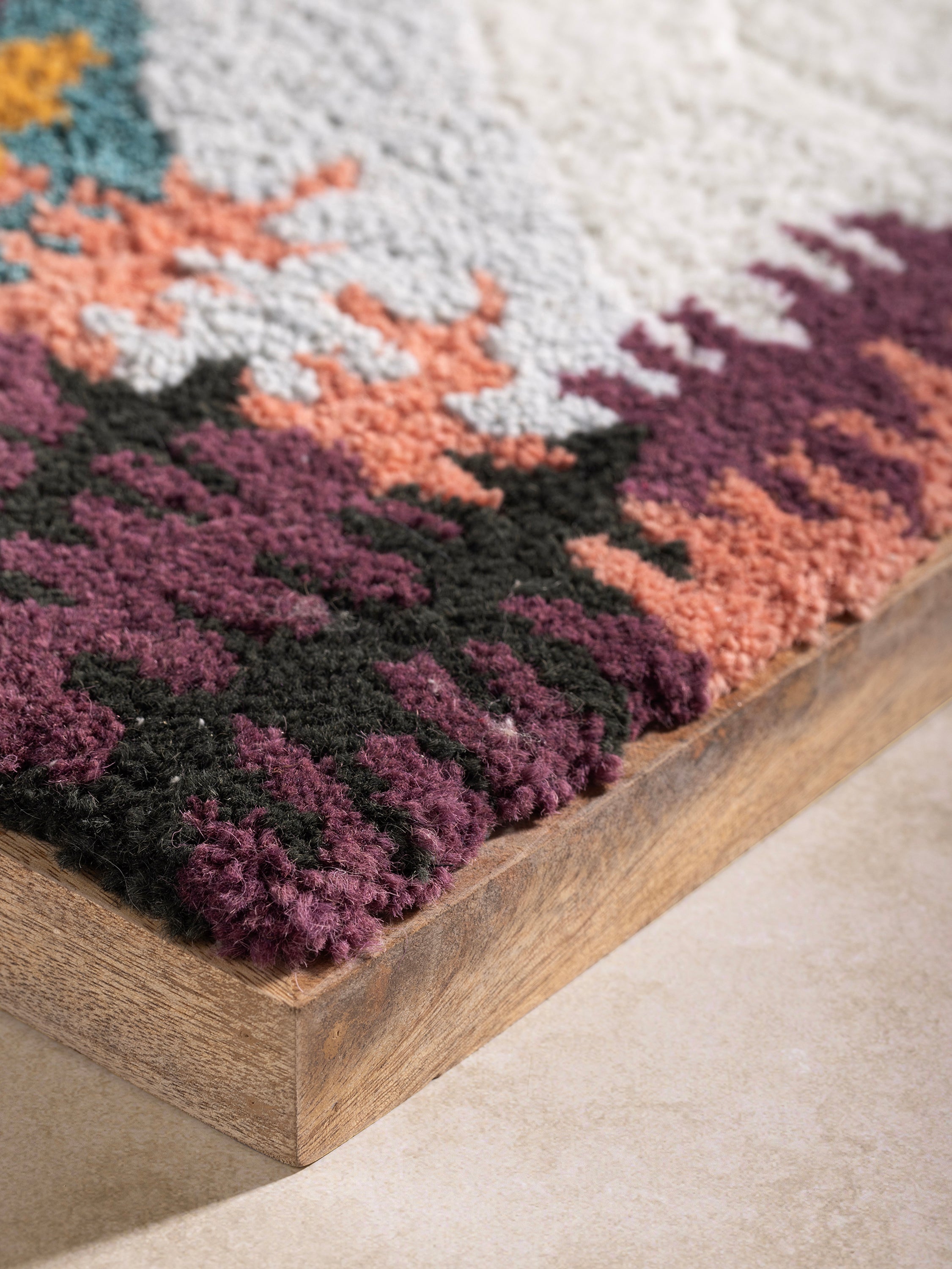 Textured wall art framed in cotton and wool with raised mountain-and-moon motif — serene handcrafted décor