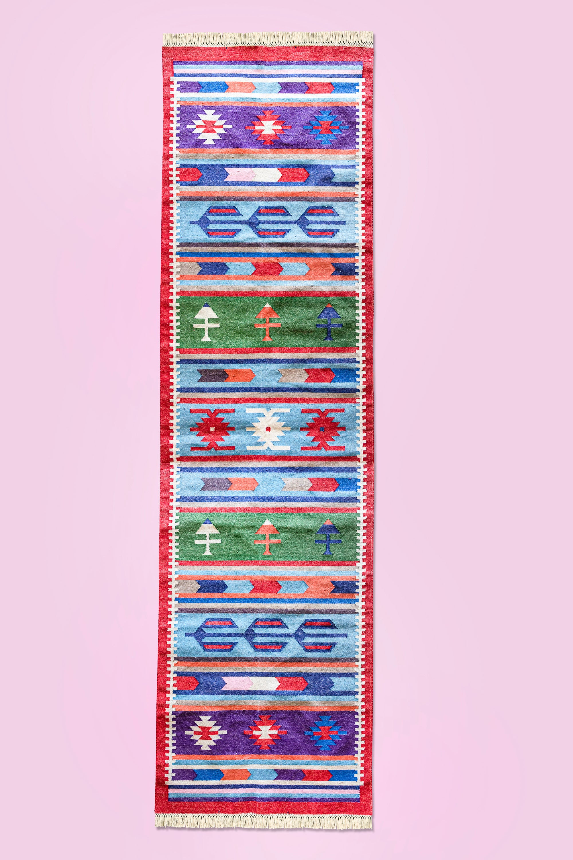 Artisan-crafted Kilim rug featuring bold tribal elements and a vintage-inspired aesthetic