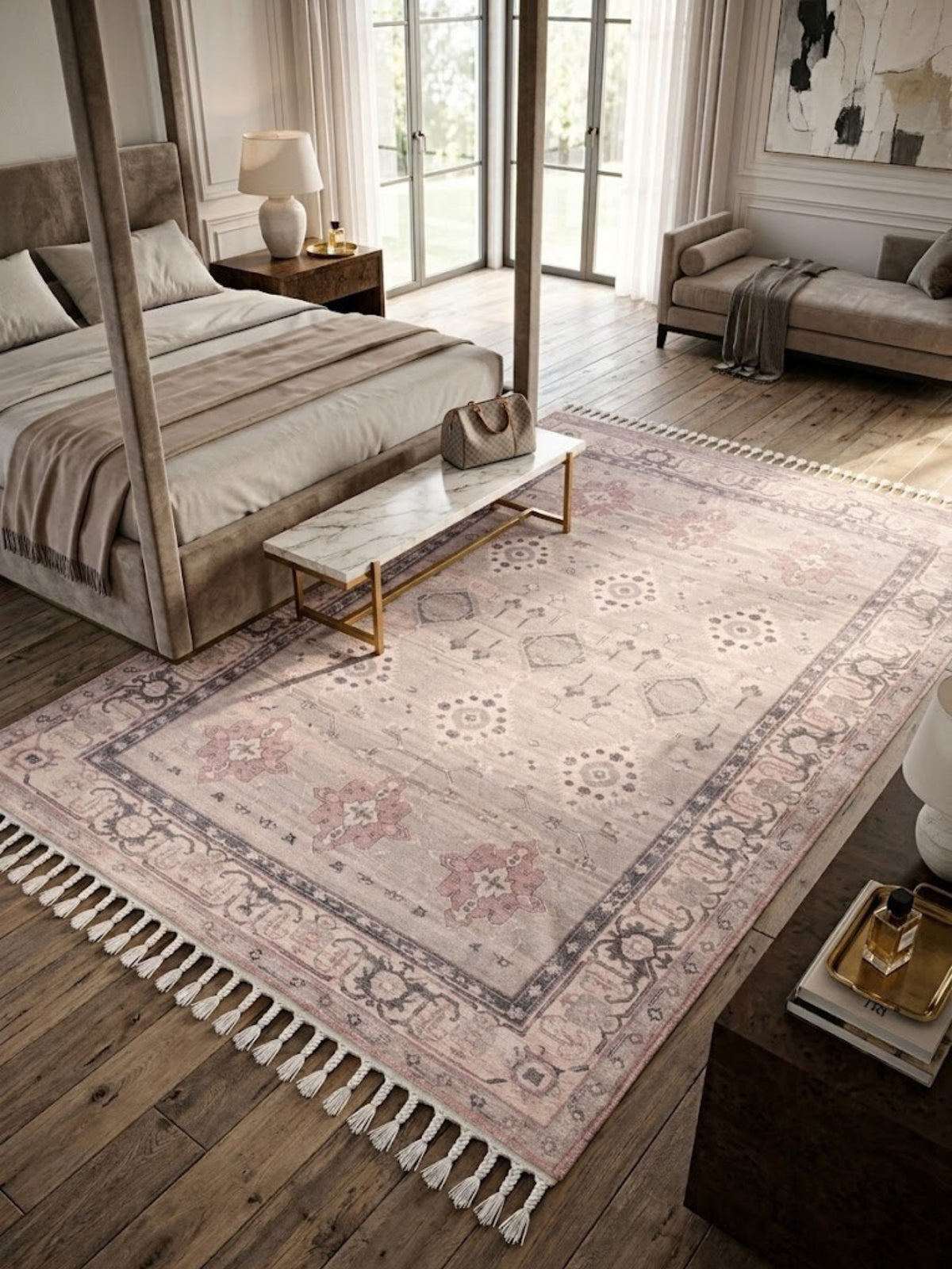 Blush and grey cotton and viscose rug styled beside a bed in a bedroom.