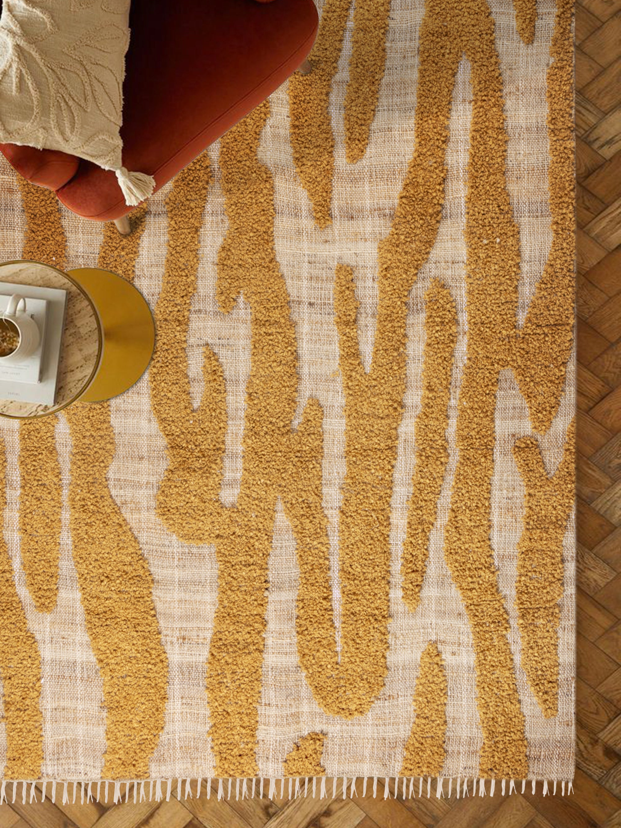 Close-up of rug surface showing flowing stripe design with contrast between raised and flat sections