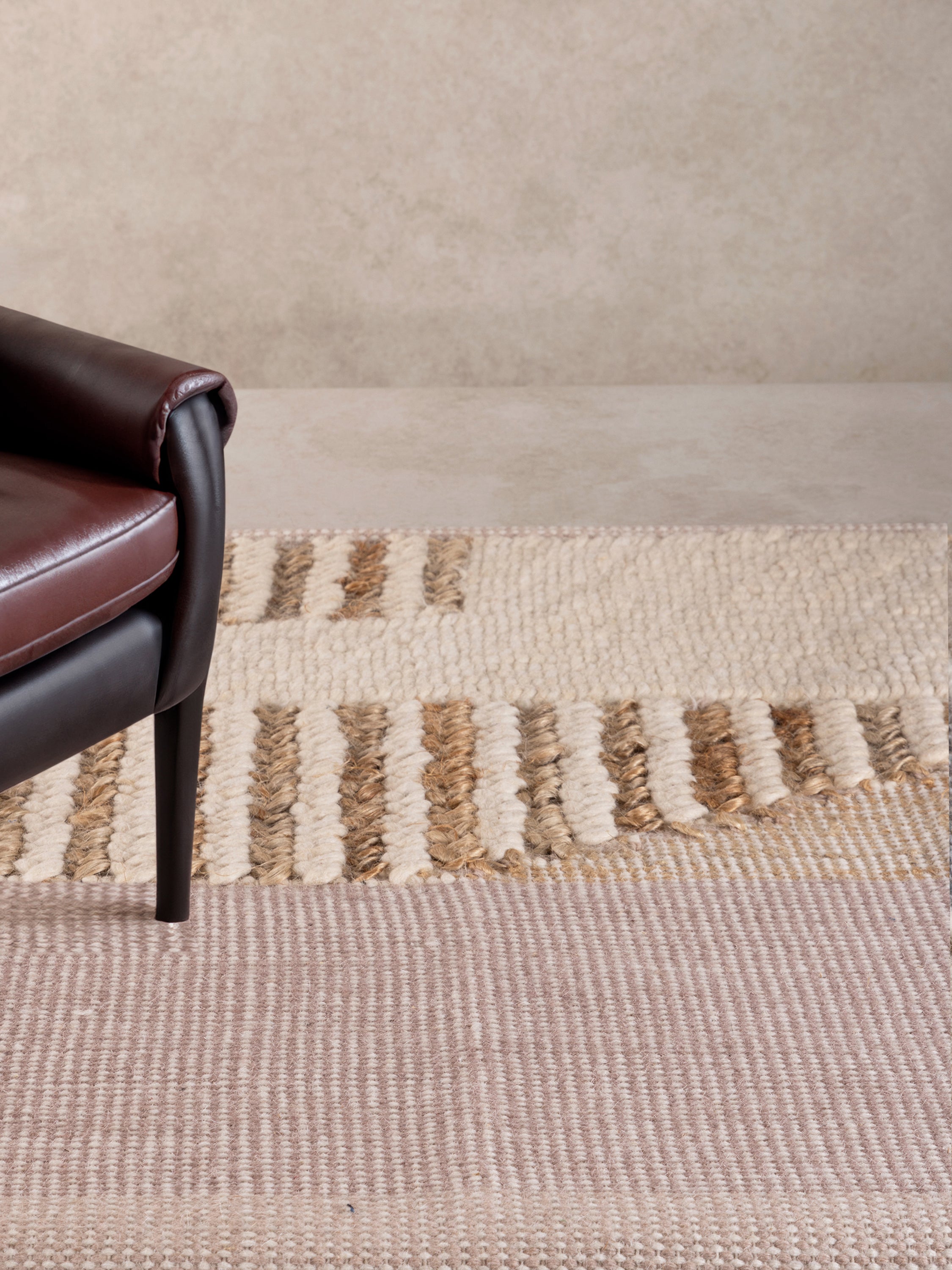 Zanzibar hand-woven area rug 5×8 with subtle pattern and warm neutral palette — textured décor essential