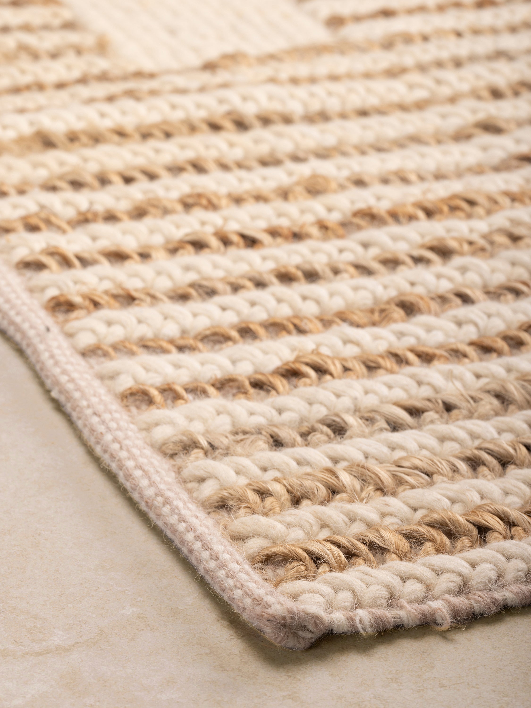 Low-pile hand-woven area rug 5×8 in beige & brown tones — modern artisan living foundation