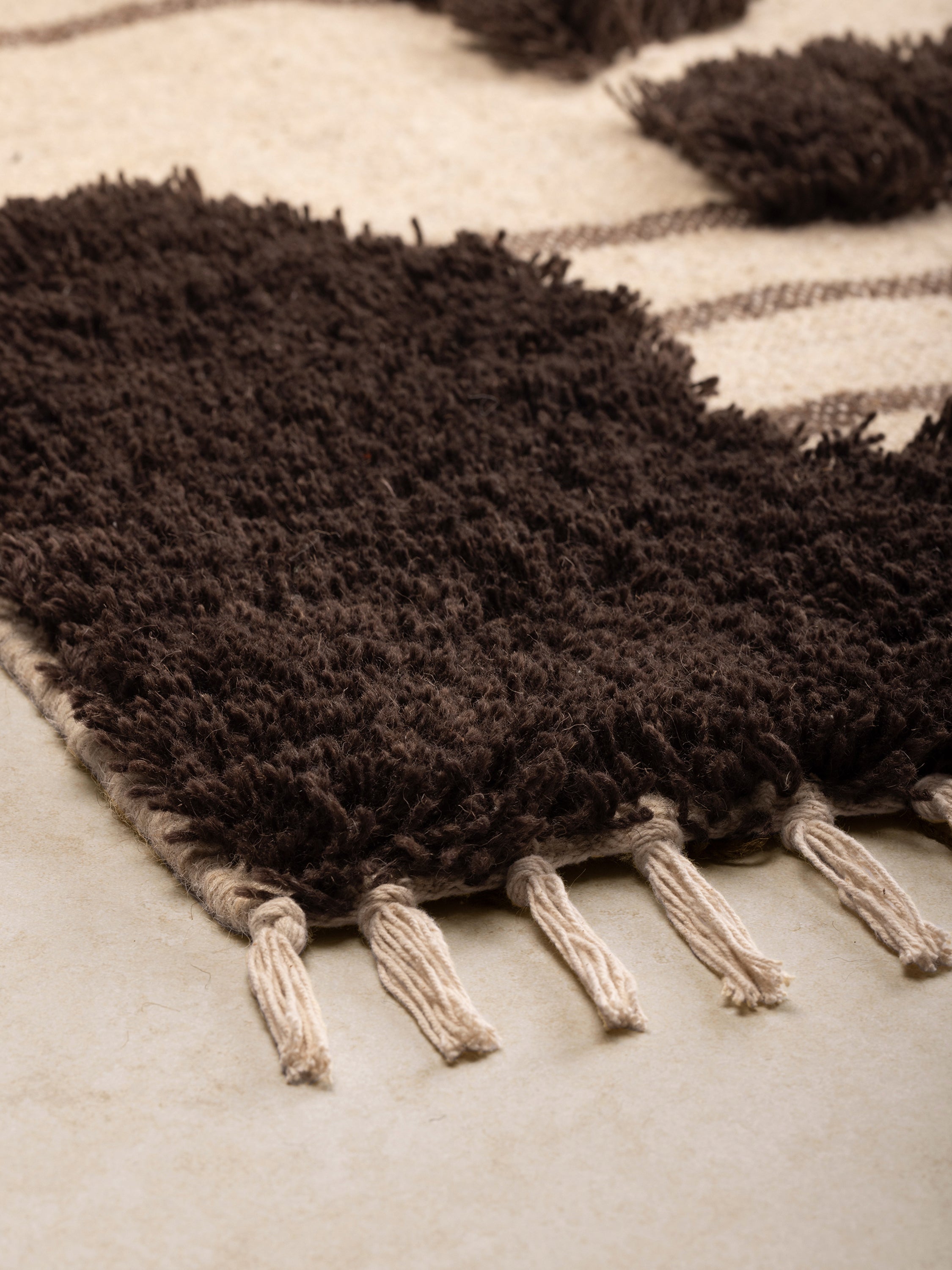 Two-level pile area rug in brown and beige tones — wool-cotton artisan floor accent