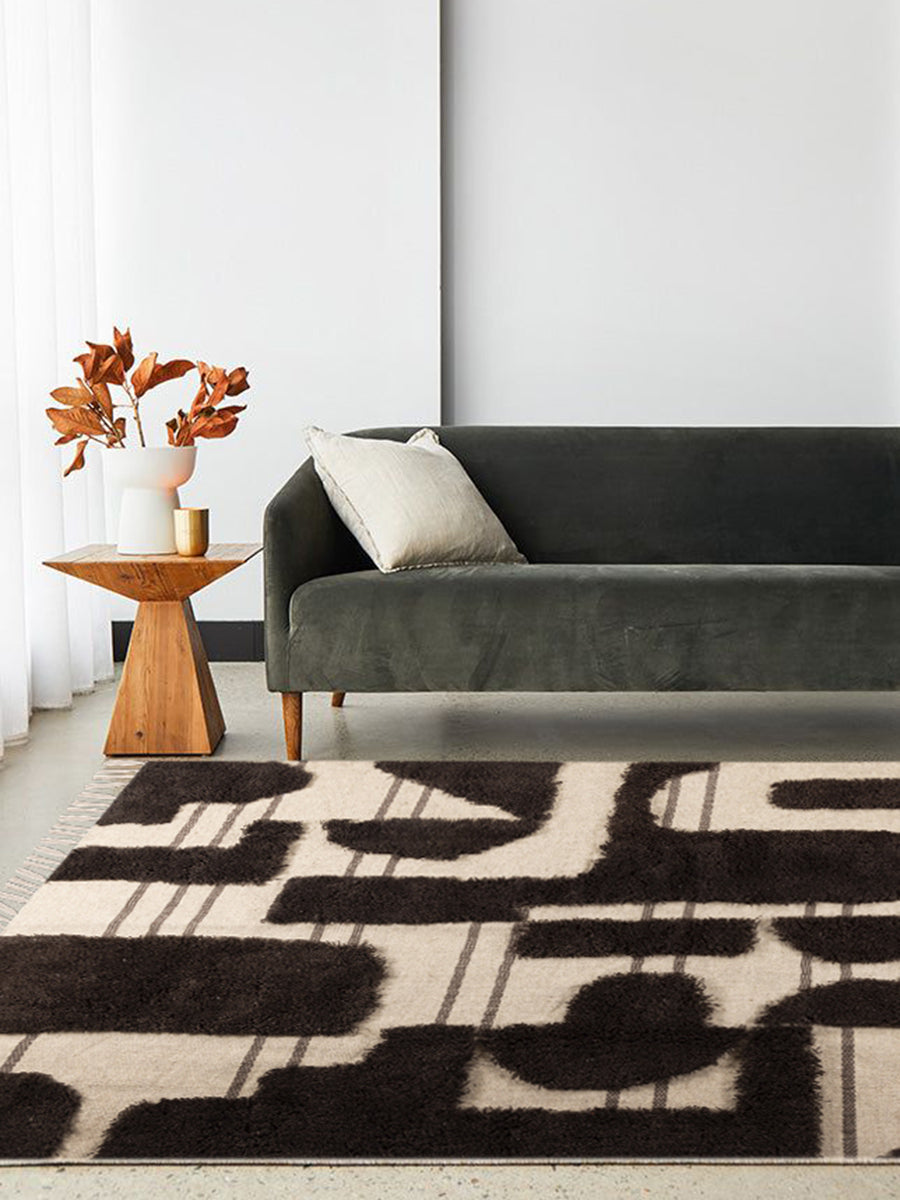 Wool and cotton rug 5′×8′ with dimensional pile — handcrafted in warm neutral tones