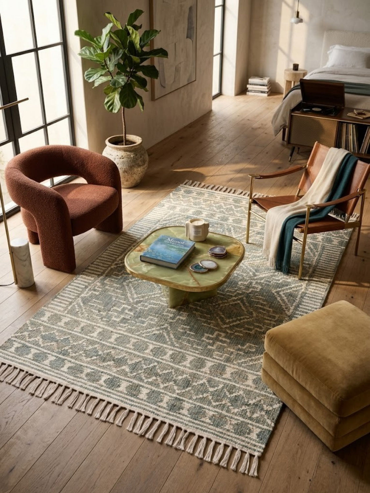 Ardmore sage and ivory flat-woven rug beneath a low coffee table in a living room.