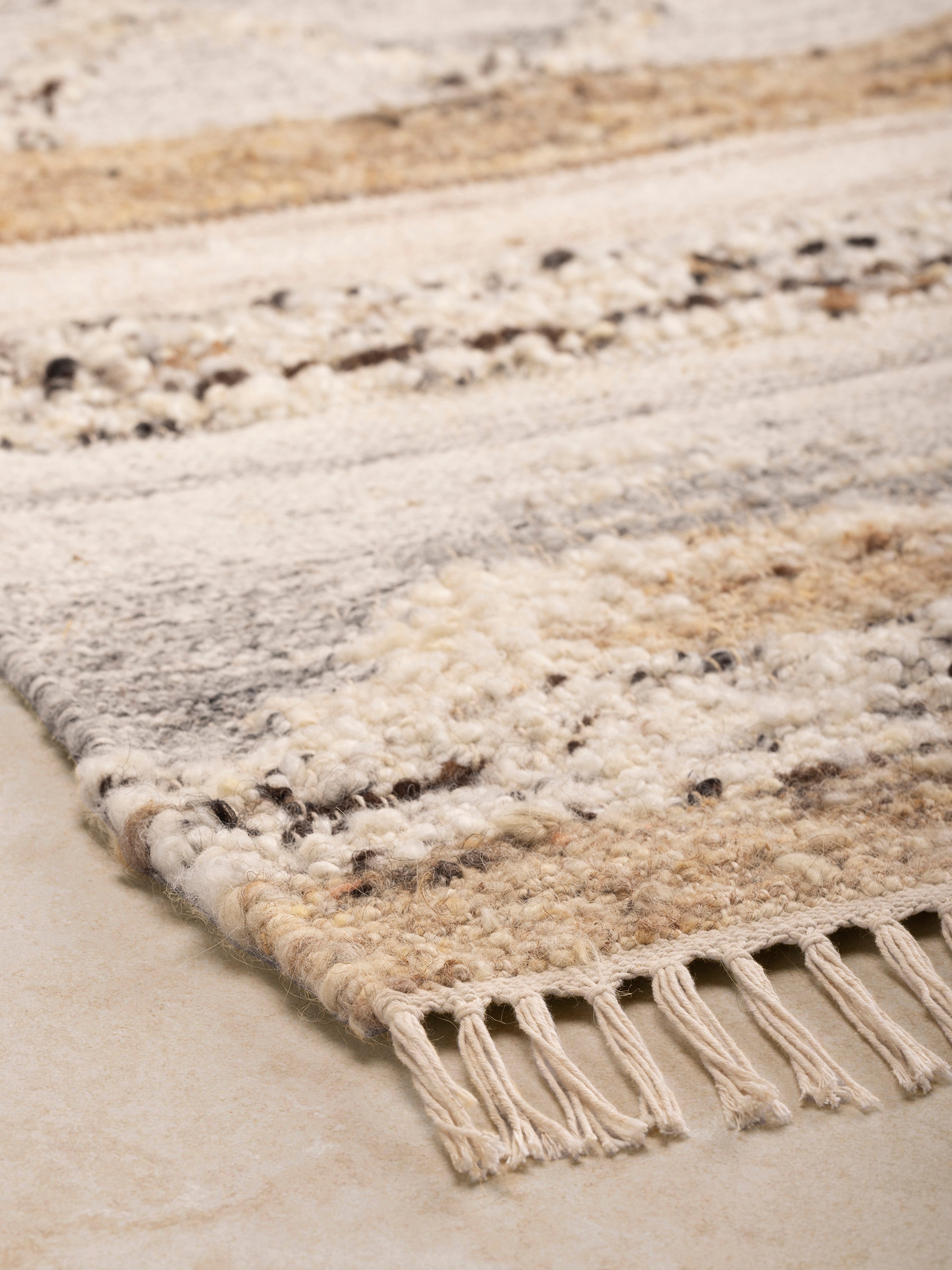 Anapolis hand-woven area rug 5×8 with subtle pattern and soft hushed palette — refined décor