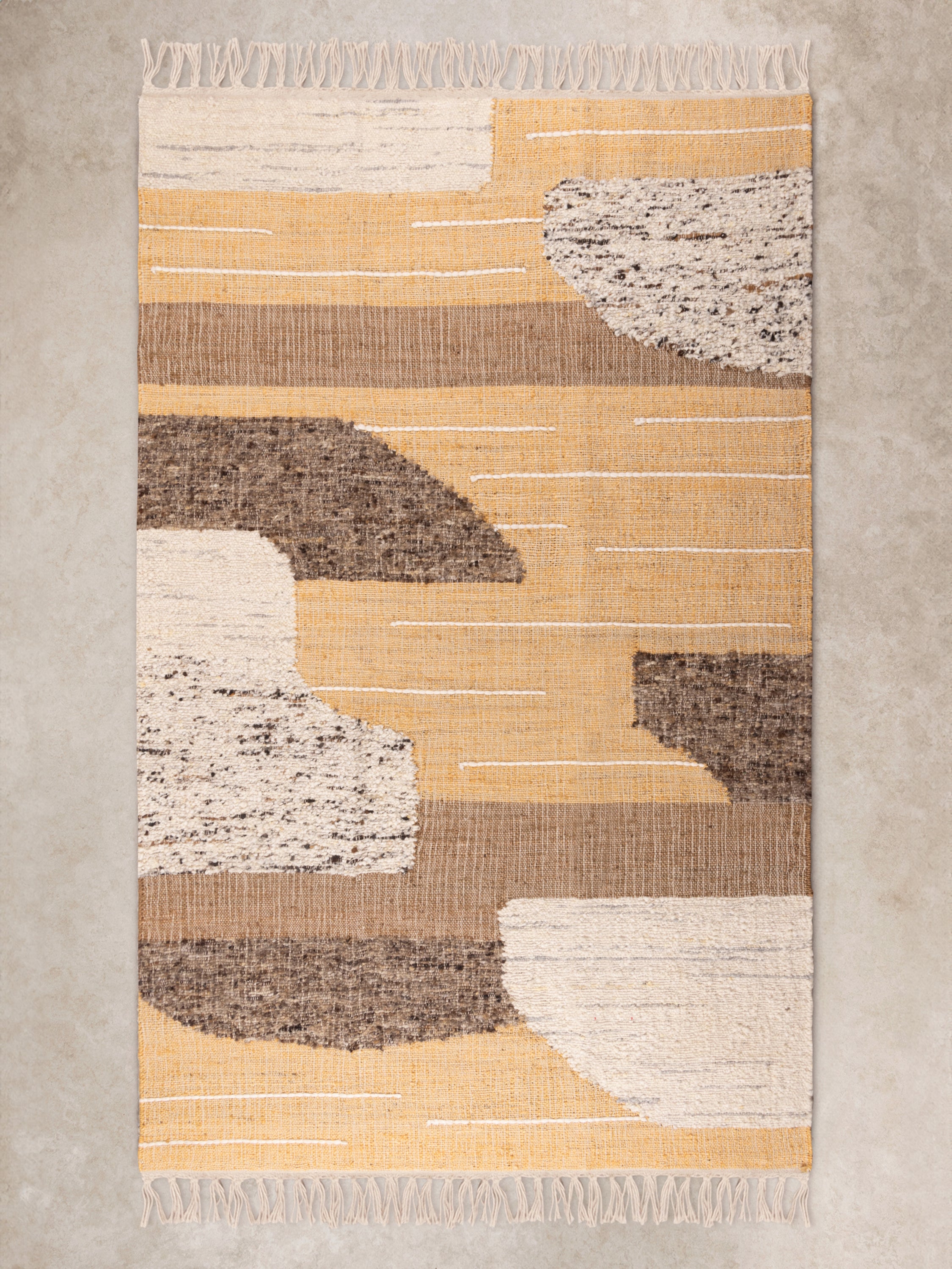 Warm beige and brown hand-woven area rug 5×8 — refined artisan floor layer