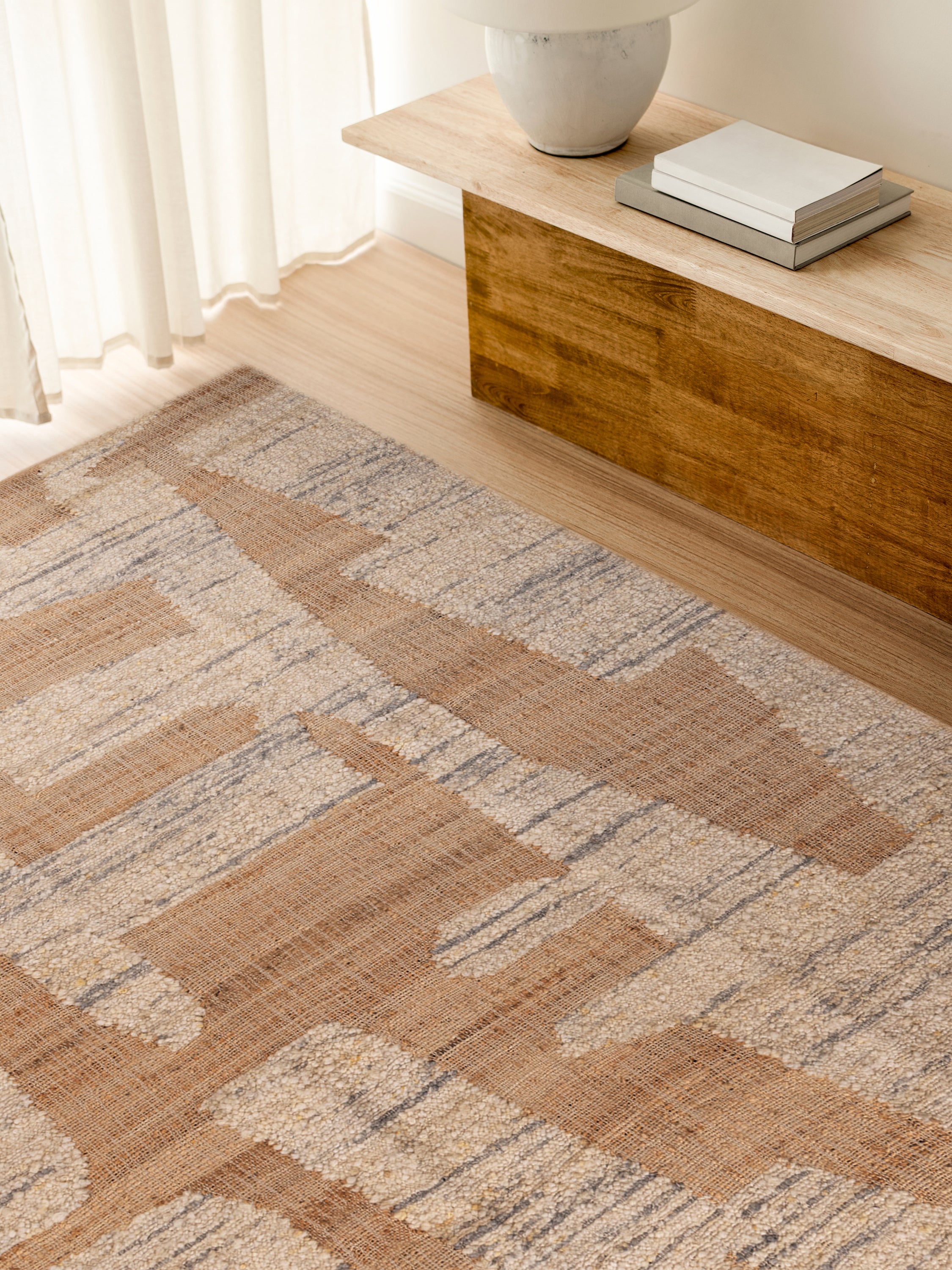 Luxury 5′×8′ area rug in soft neutral abstract design — crafted for elegant living spaces