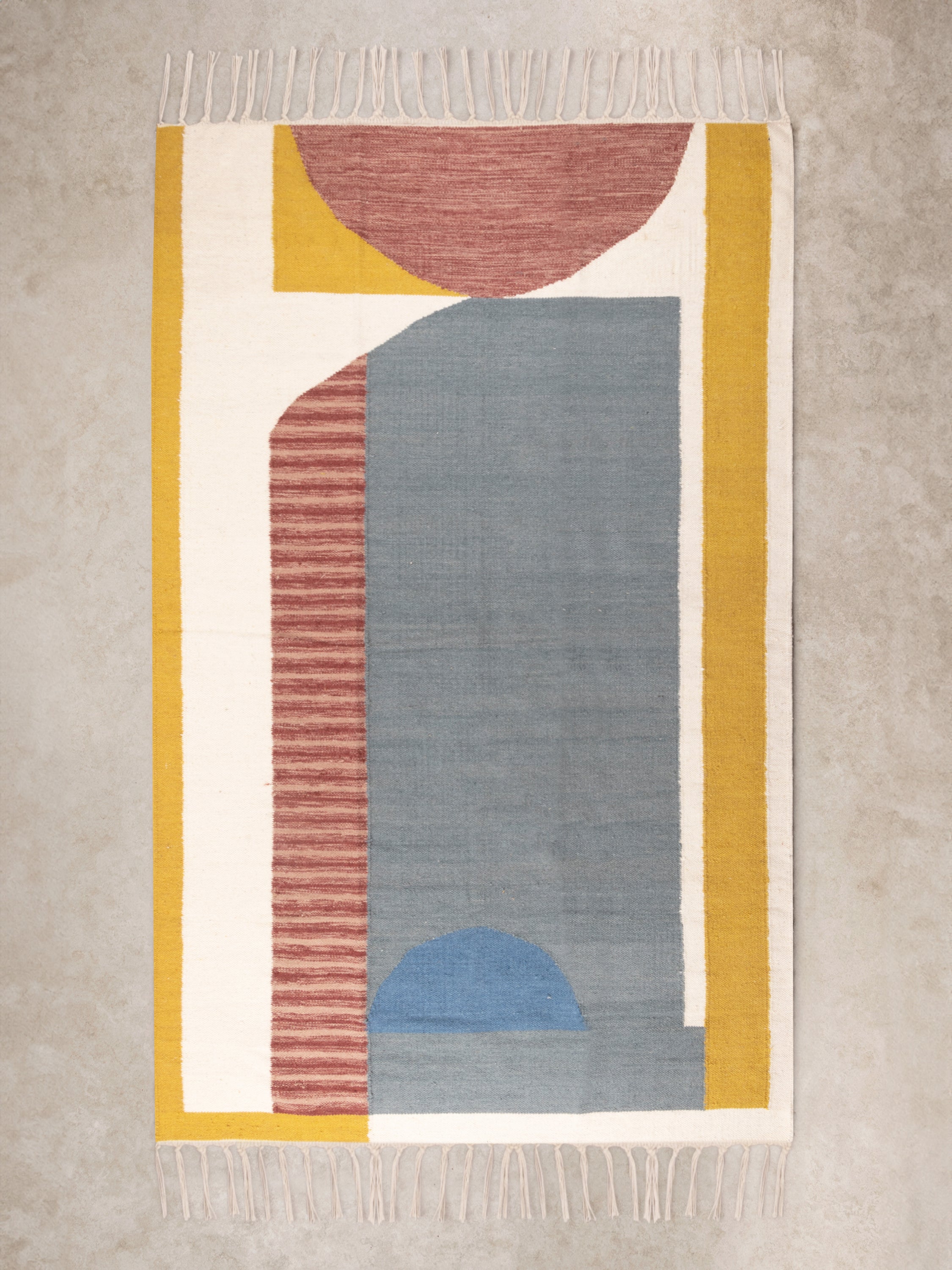 Handwoven multicolored geometric area rug 5×8 with fringe — artisan décor accent
