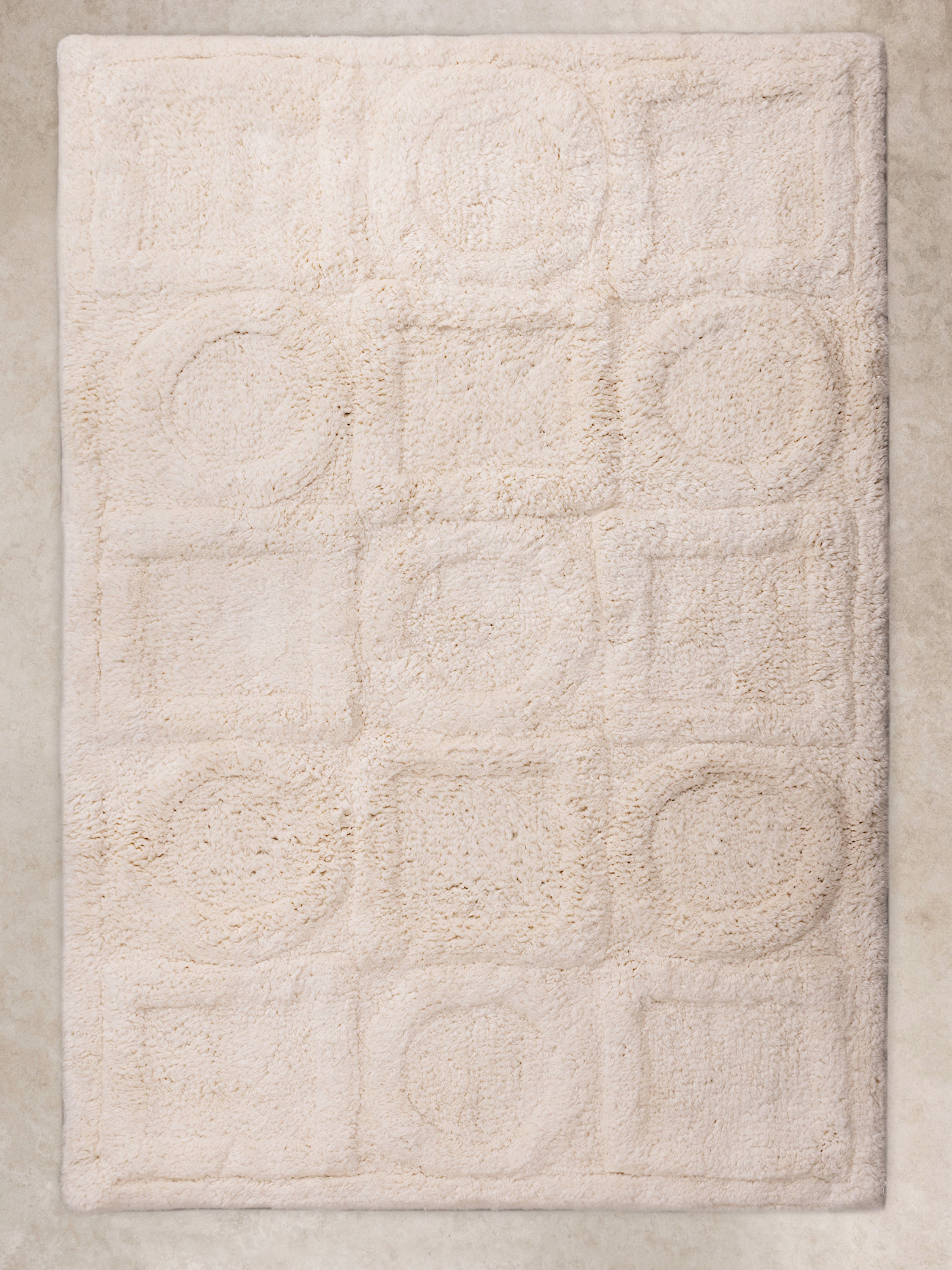 Ivory Bathroom Rug with Textured Geometric Design – Soft and Absorbent