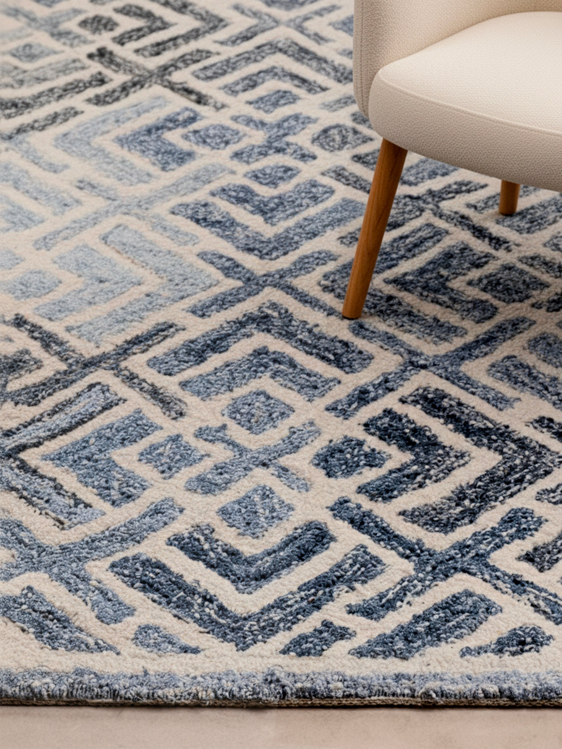 Coastal-style Santorini rug styled in a bright interior, highlighting its nautical pattern and tufted detailing
