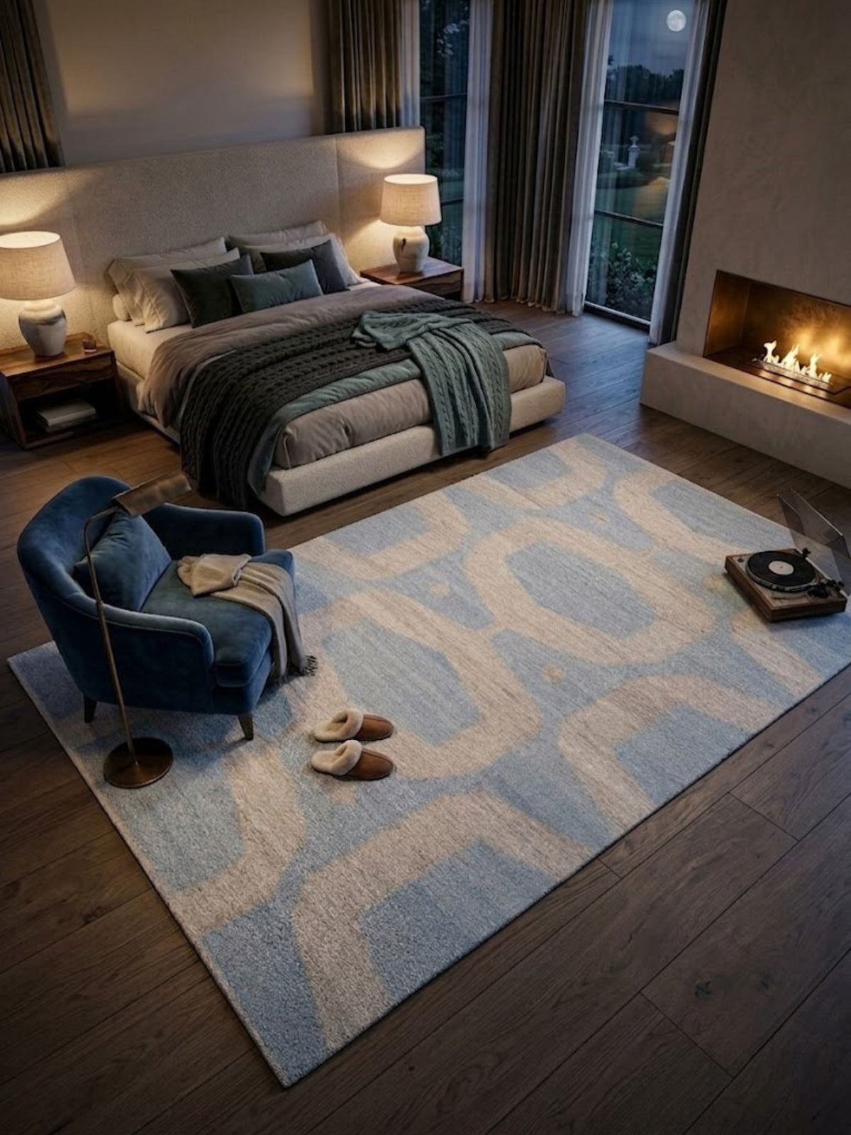 Oval-motif flatwoven wool rug with an arched silhouette in blue and sand, styled in a bedroom.