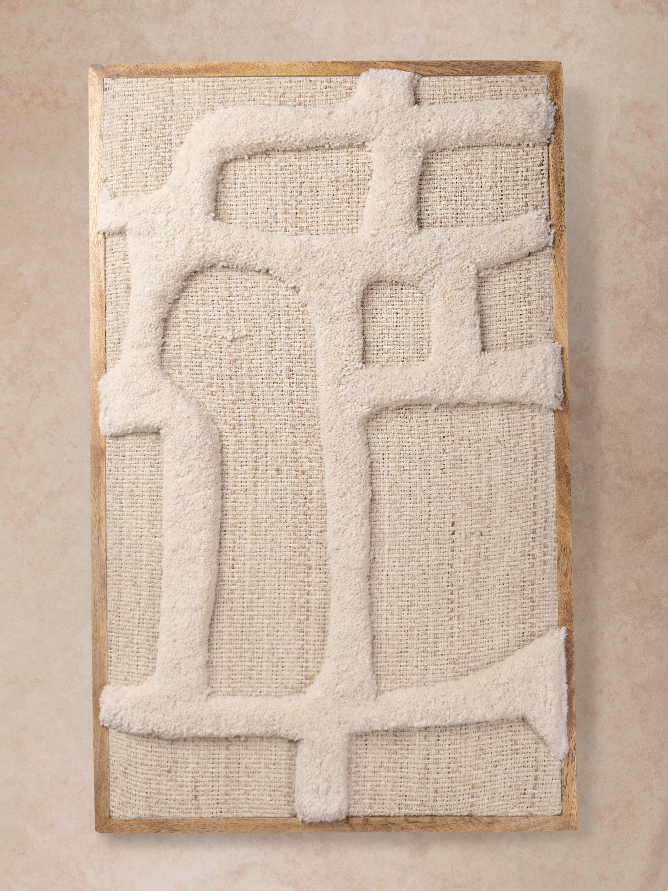 handwoven tufted wall art with sculptural ivory pattern and wooden frame