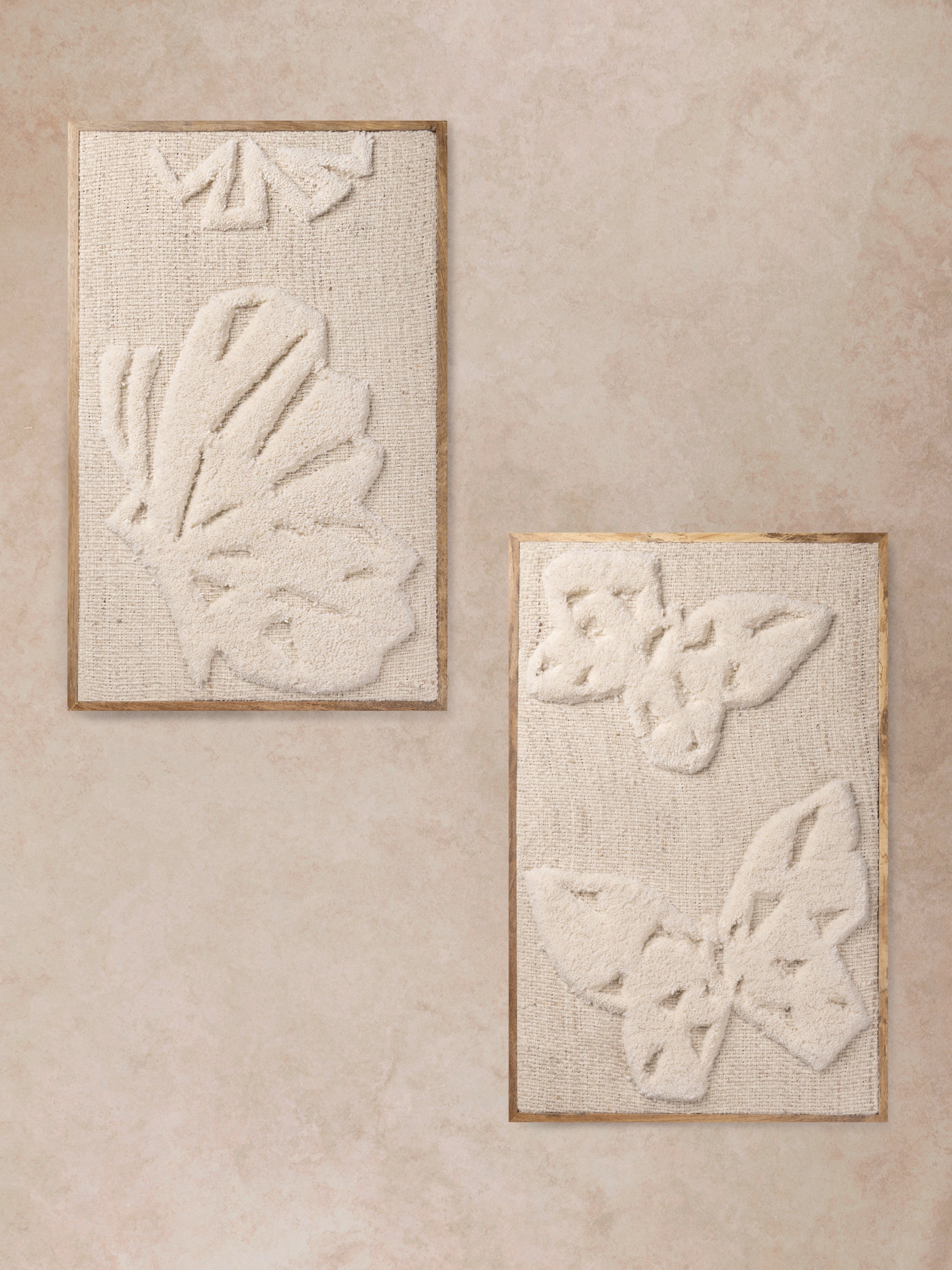 pair of Monarch wall art panels displayed together on a neutral wall
