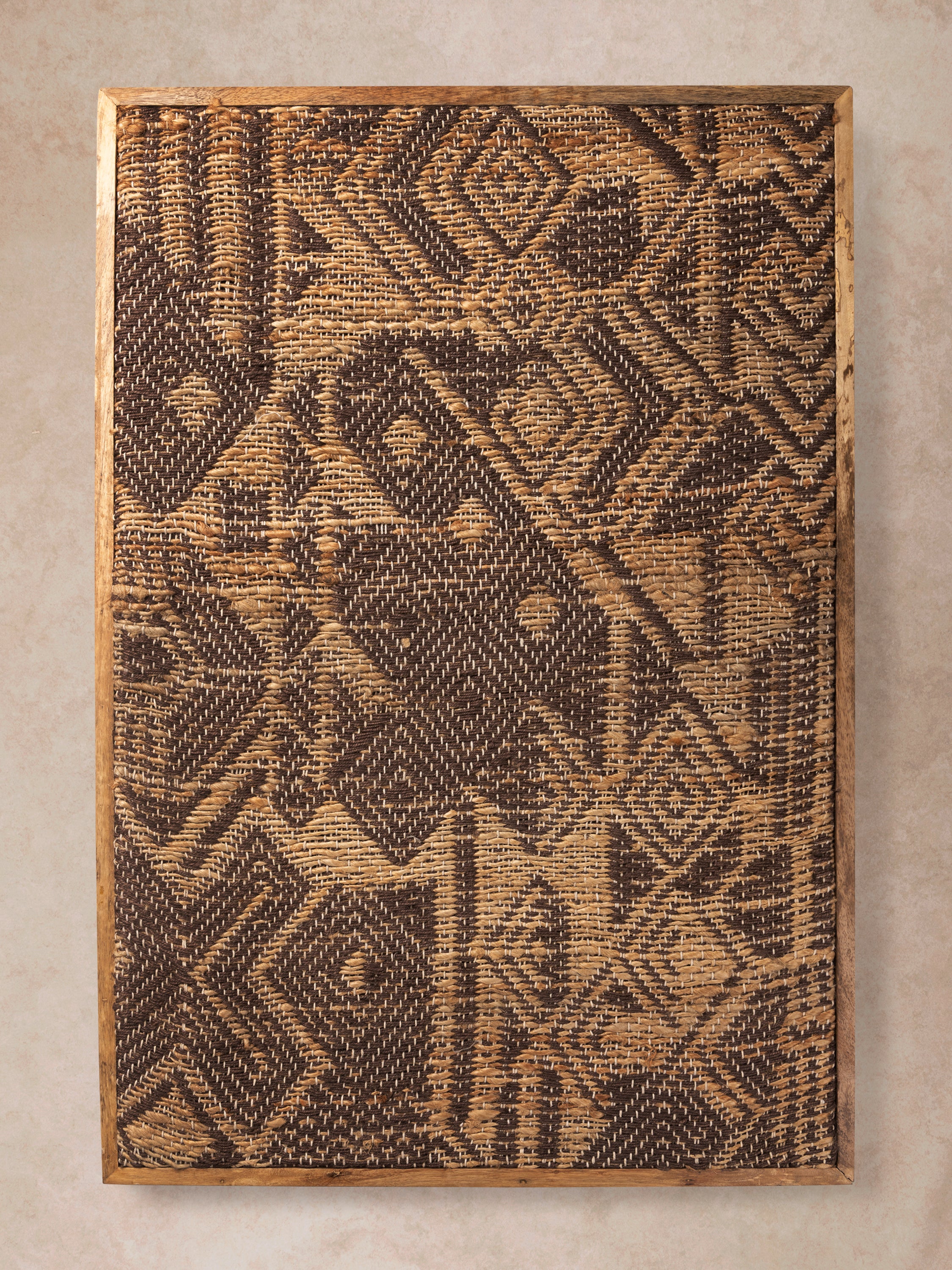 jacquard woven jute wall art with geometric patterns in natural wood frame