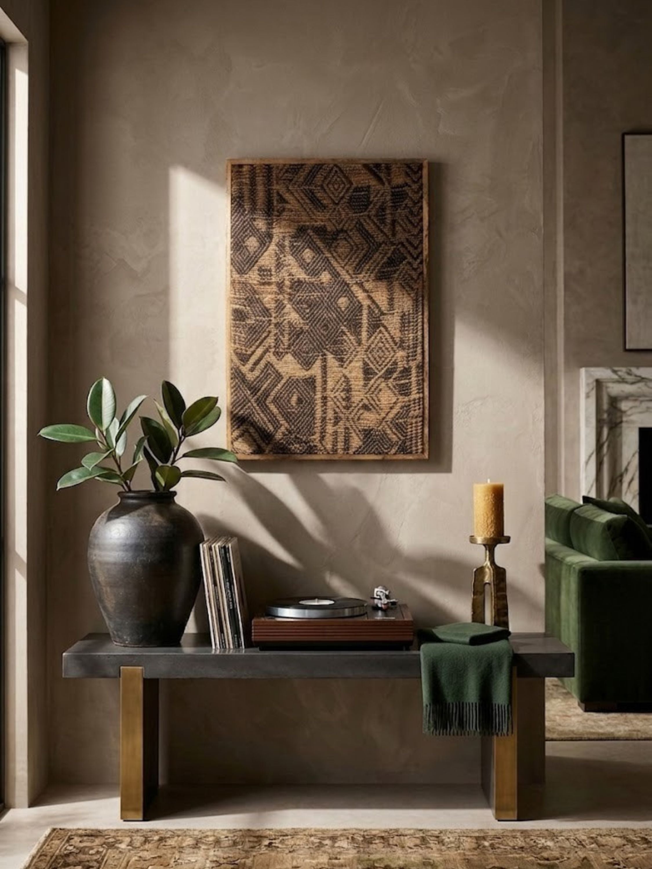 Jute wall art styled in an entryway.