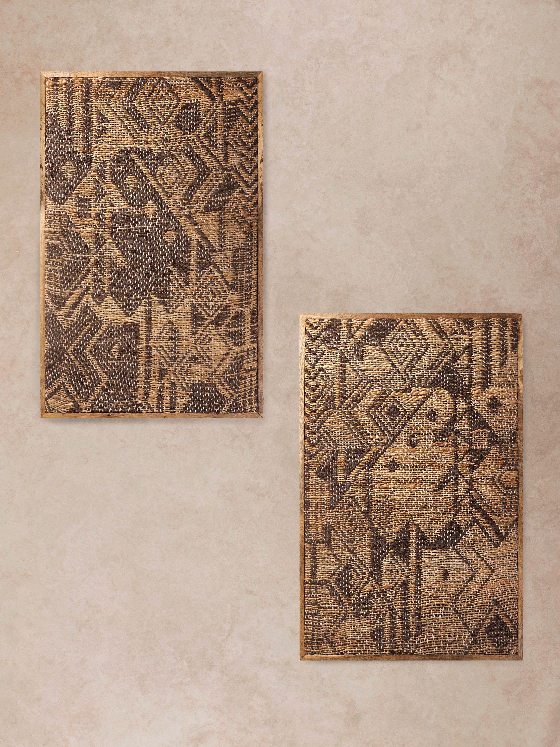 pair of Madagascar woven jute wall art panels styled together in neutral interior