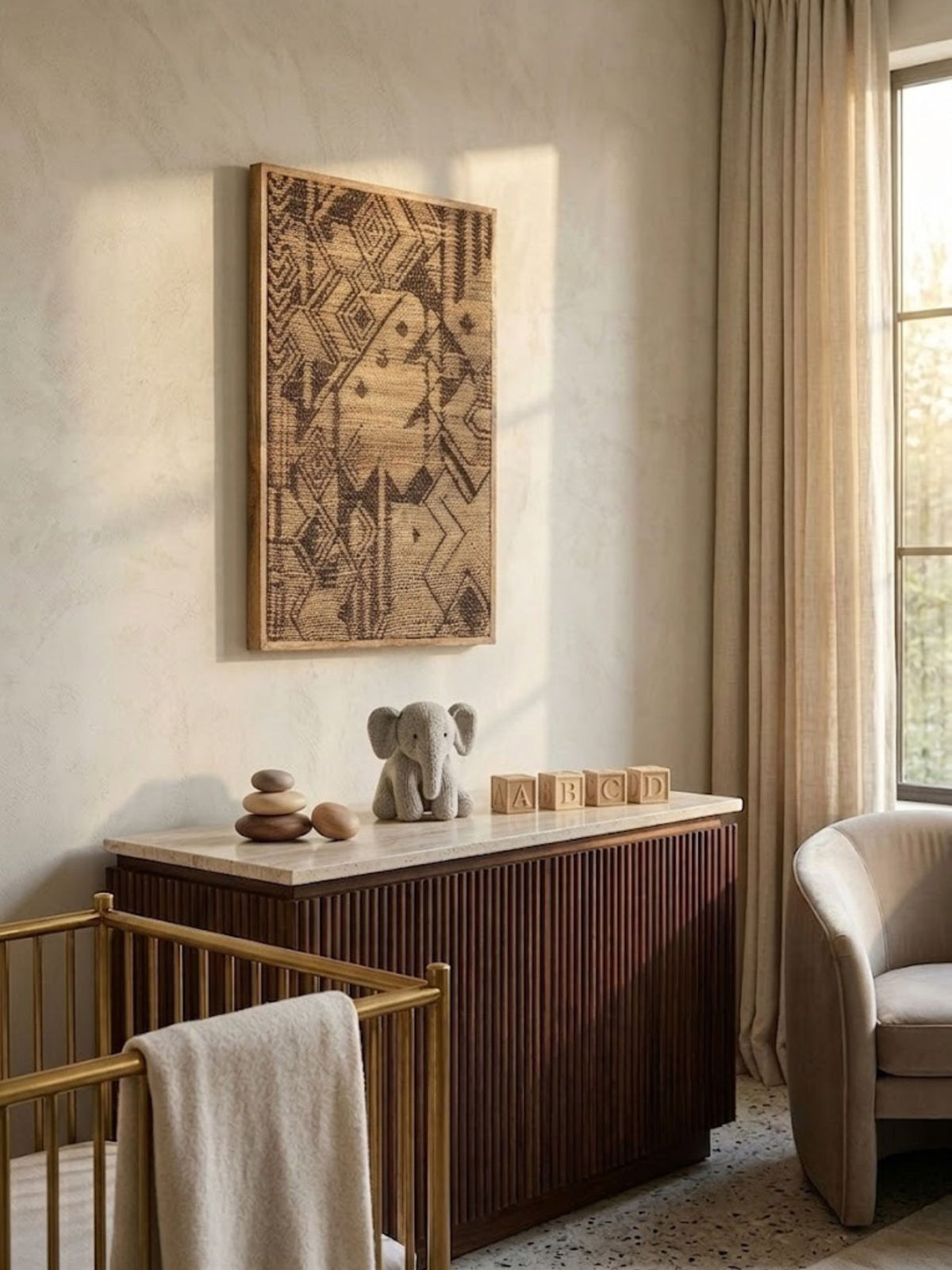 Jute wall art styled in a nursery.