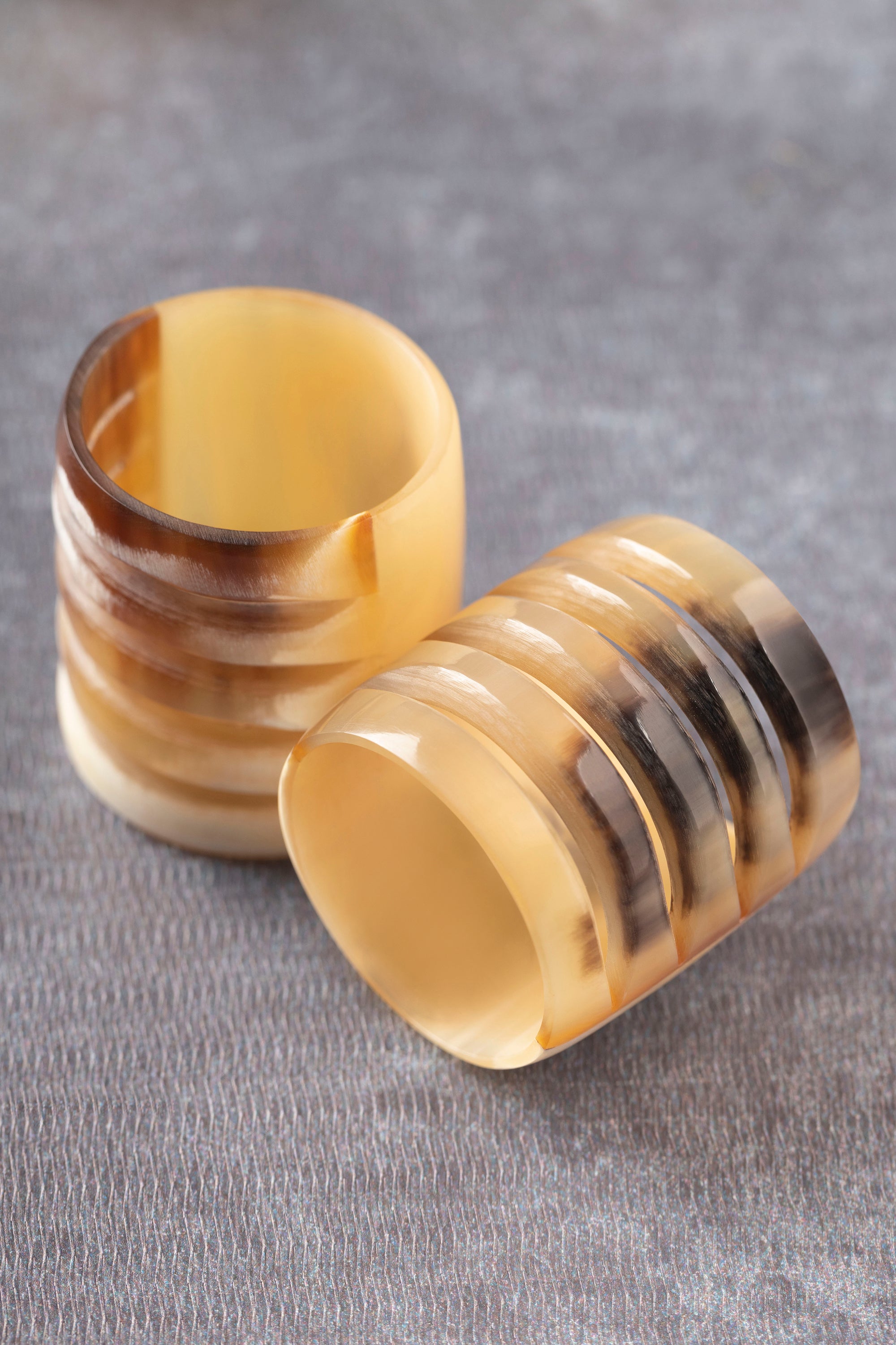 Artisan-made napkin rings set of six in brown horn, designed for elevated table settings — luxury home layer